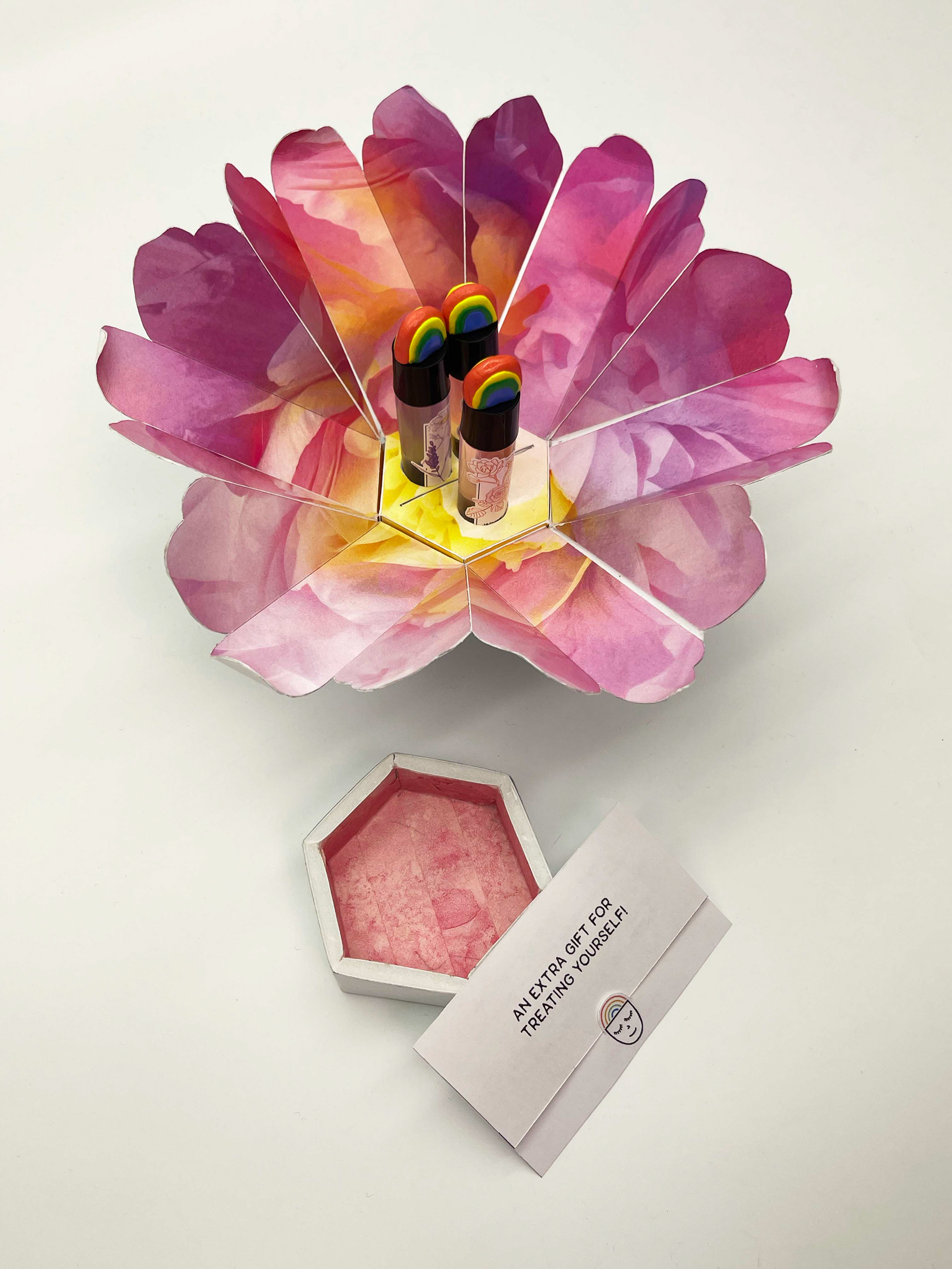 Box opens up into a bright fuchsia flower, with a thank you card.