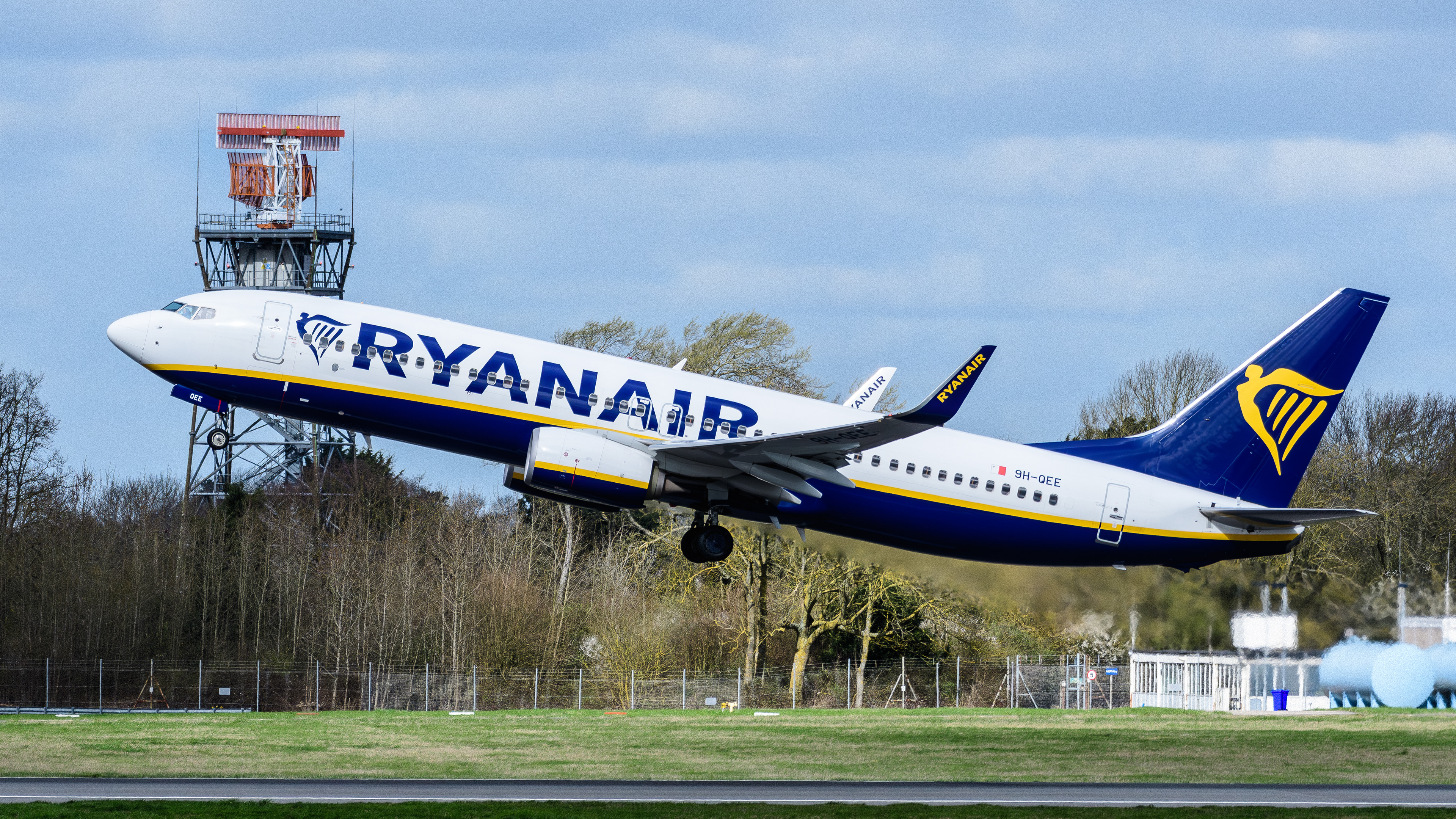 Boeing 737 operated by Ryanair departing Stansted Airport. Registration 9H-QEE.