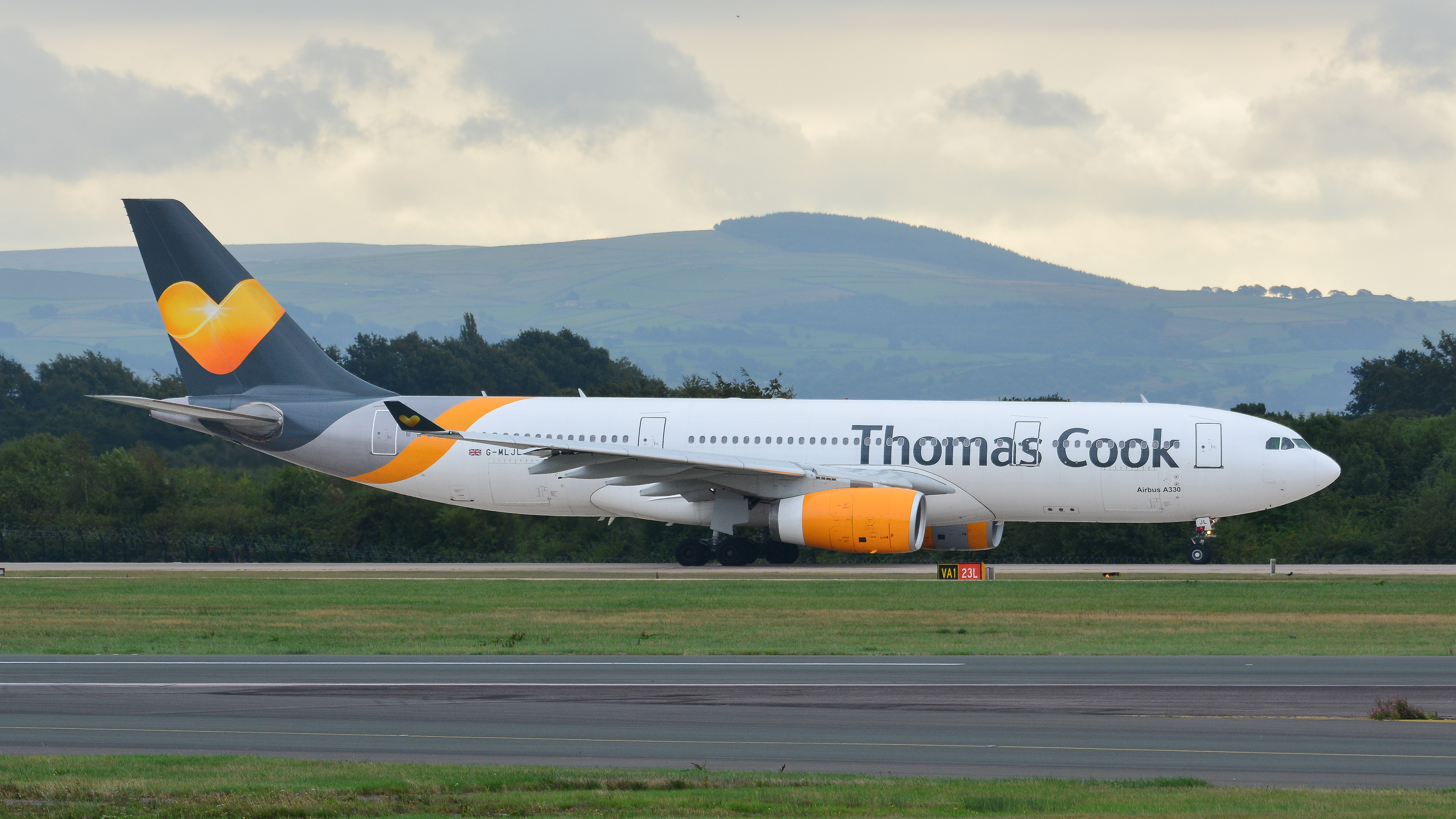 Airbus A330 operated by Thomas Cook departing Manchester Airport. Registration G-MLJL.