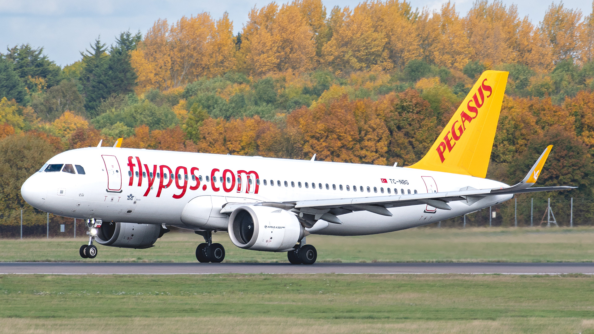 Airbus A320 operated by Pegasus departing Stansted Airport. Registration TC-NBG.