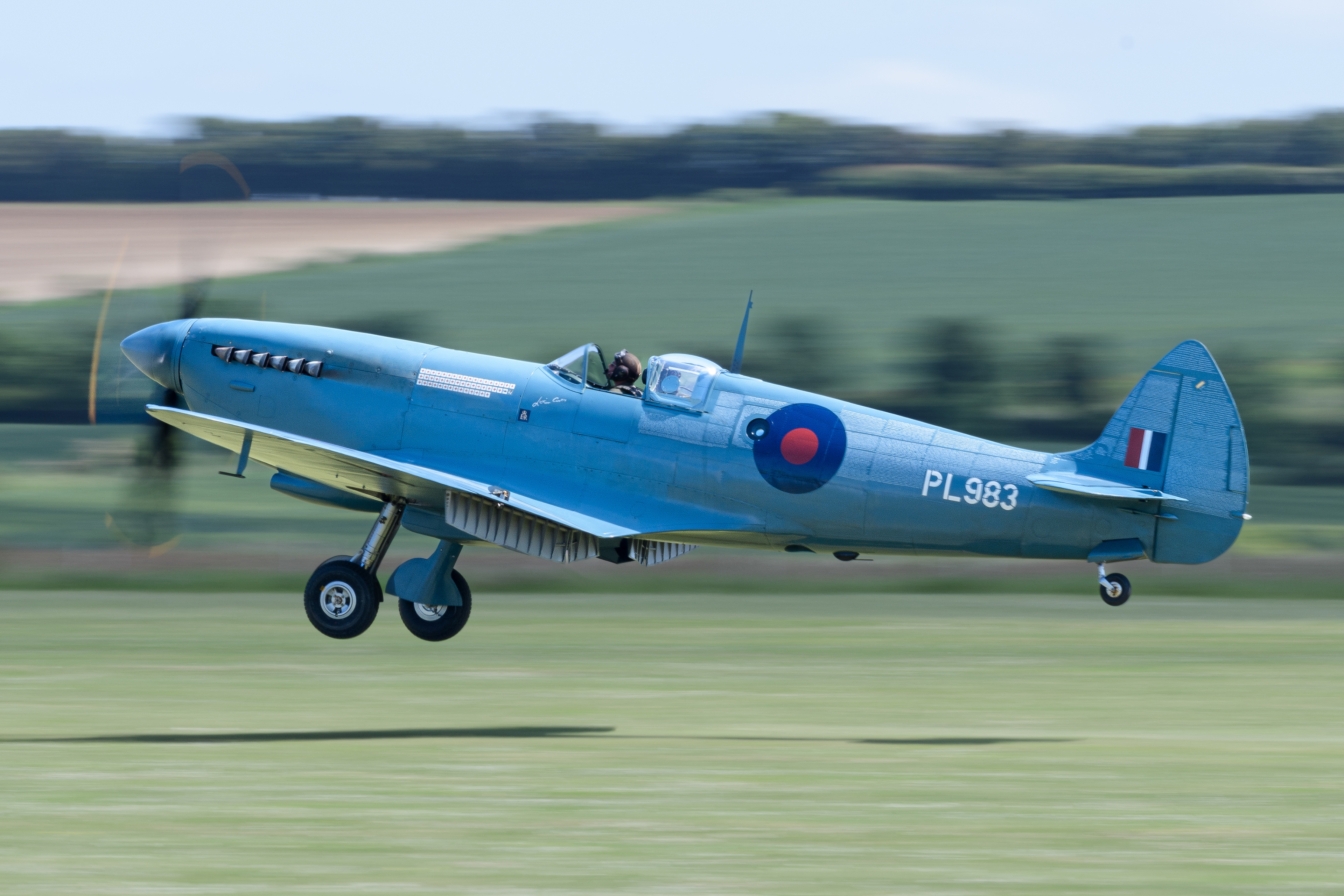 Spitfire taking off from IWM Duxford in June 2023. Registration / serial G-PRXI / PL983.