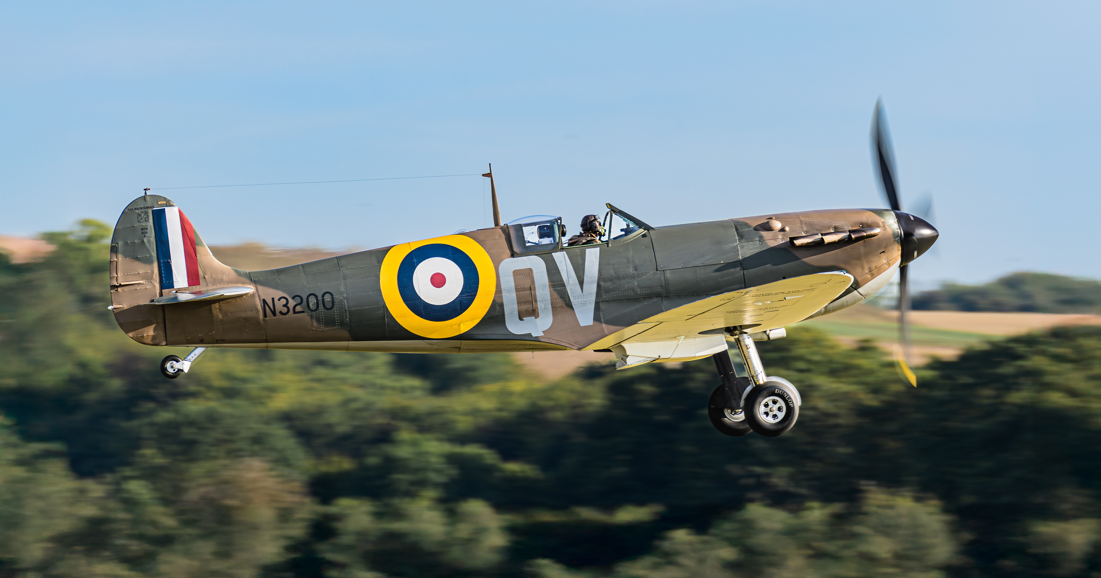 Spitfire departing IWM Duxford in September 2024. Registration / serial G-CFGJ / N3200.