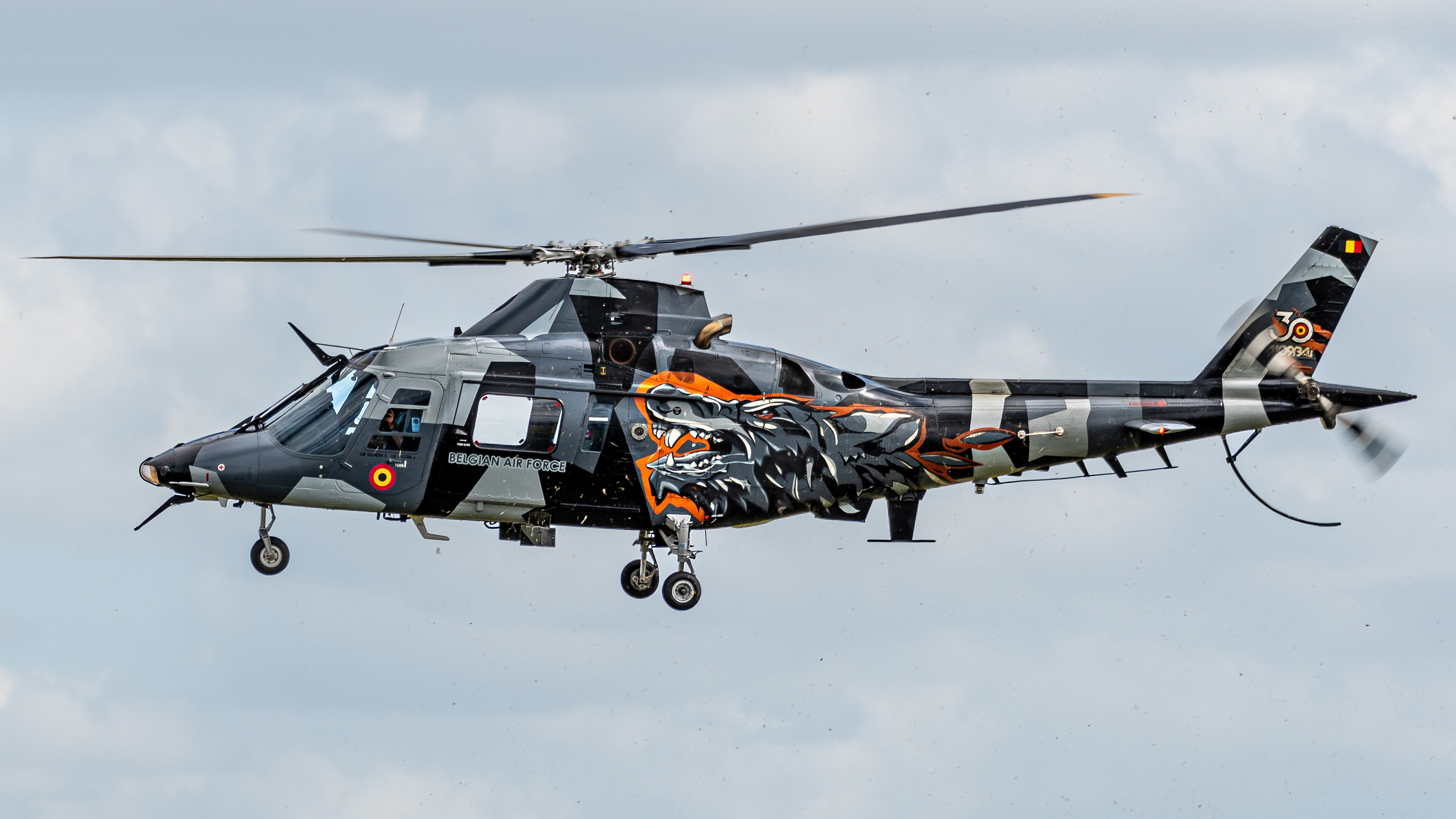 Agusta Westland A109 helicopter from the Belgium Air Force performing at RAF Cosford in June 2022.
