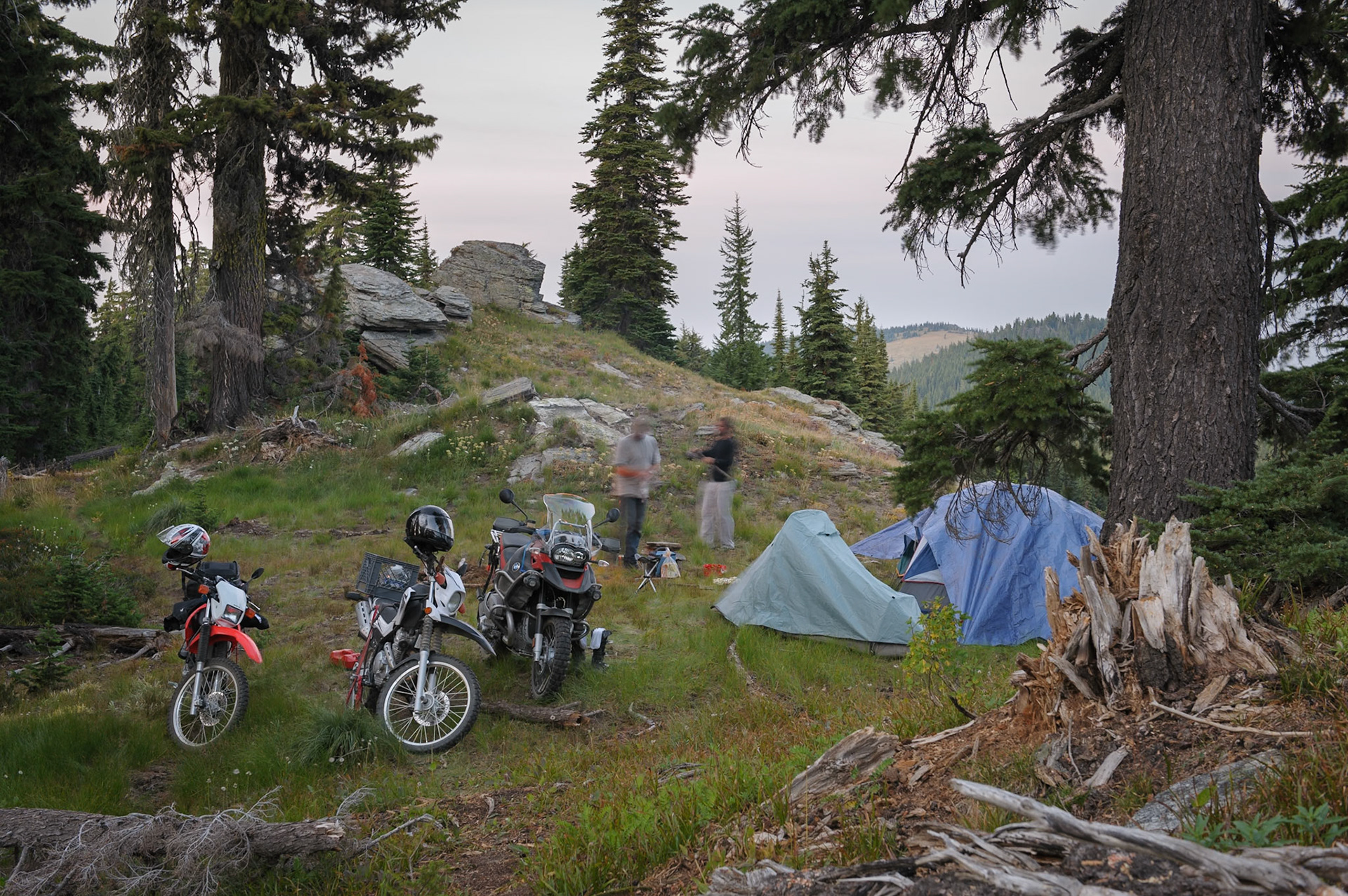 Somehow I followed my brothers down the slope on the lumpy grass and back up to turn around without falling over, while in my head I continued to rant about needing a lower first gear.We considered a spot on a mound among some boulders that would have felt like camping at Stonehenge or something but again we didn’t see room for the tents. We chose a relatively flat area right next to the mound.