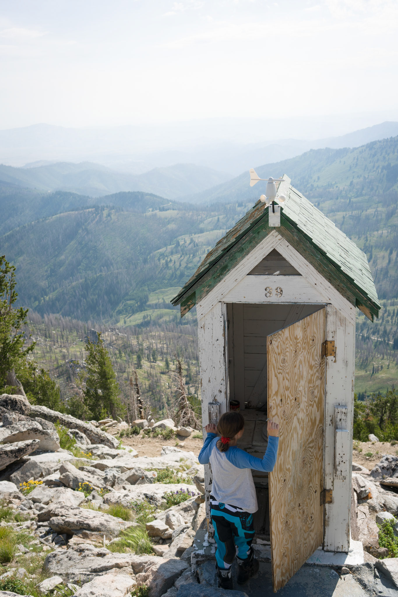 “It just goes onto the rocks underneath,” Brenna tells me, a bit mortified, as she emerges from the odd outhouse atop the mountain.She is still nervous about the ride down so I make up a silly song as we begin bumping over rocks. “Bump-duddy-bump, we go around the rocks.”I know she has (suffers from?) my analytical bent so I also explain as I navigate. “I’m always looking up ahead to decide which is the smoothest way. It’s like a game. It’s fun.”“Keep singing,” she insists after I think she’s had enough. Soon she’s chattering, half singing along with the mild euphoria that follows a release of anxiety.