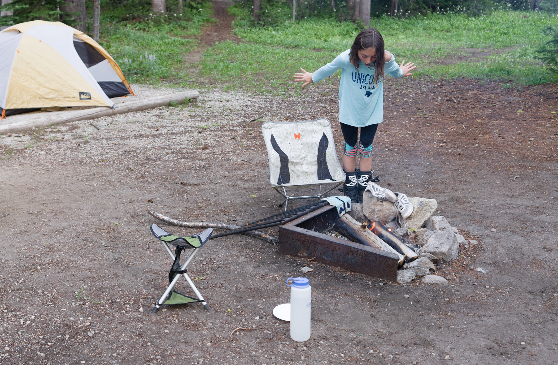 “Now what are you going to wear?” I ask when Brenna returns with soaked shoes. The answer, it turns out, is motorcycle boots.