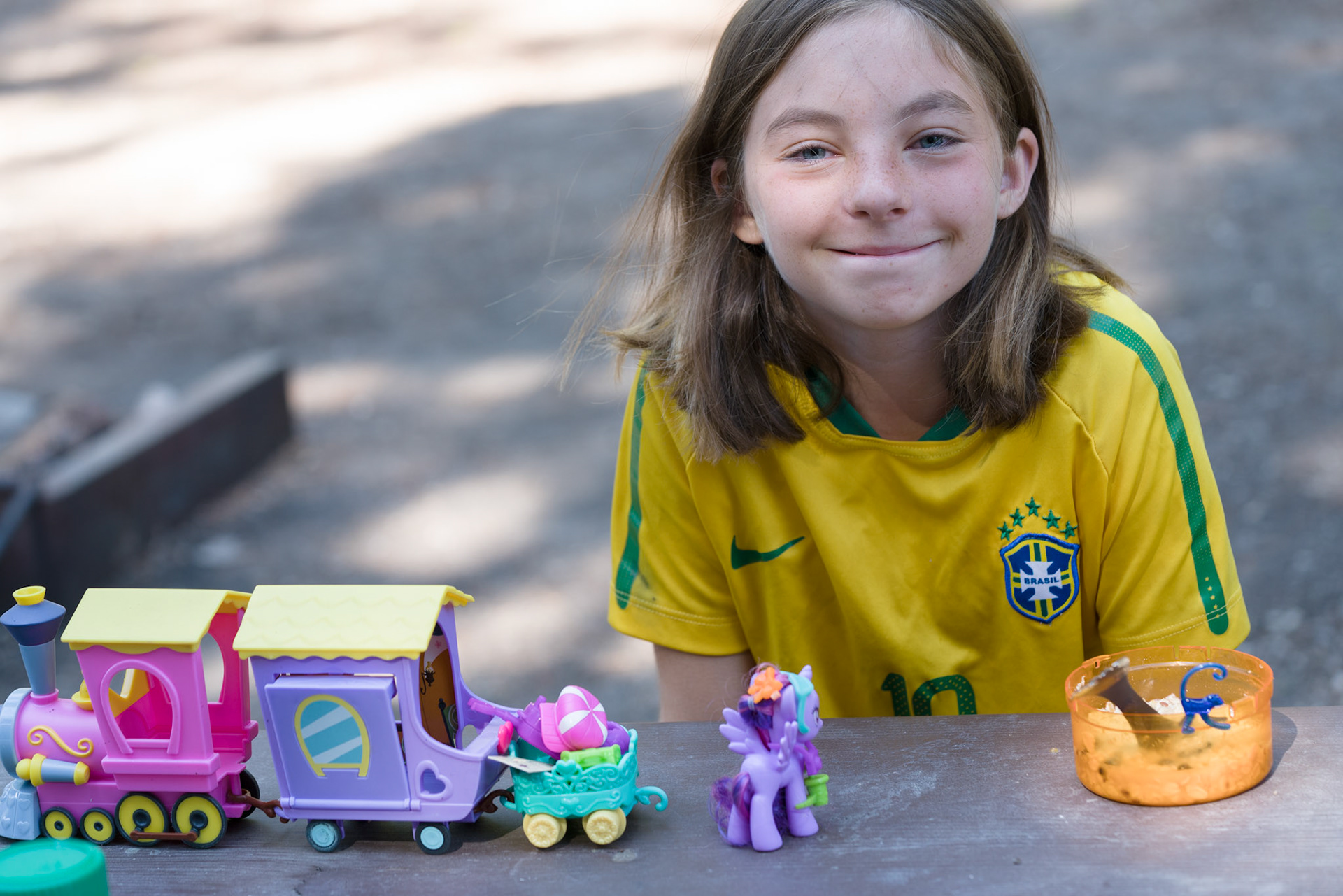 Morning finds Brenna still sleepy-eyed, driving a train of My Little Ponies across our picnic table. She got rid of her substantial MLP collection last year, presumably having outgrown them. But lately she’s plead for Fred Meyer trips to re-acquire each pony.I think it’s great to play with toys, to imagine stories, at any age. I’m always delighted to watch her build their worlds and voice their interactions.At the same time, I’m sensitive now to behaviors that might be coping mechanisms. Last week she voluntarily spent two days cleaning and arranging the house and I wondered if it was an effort to put things right, back where they belong.