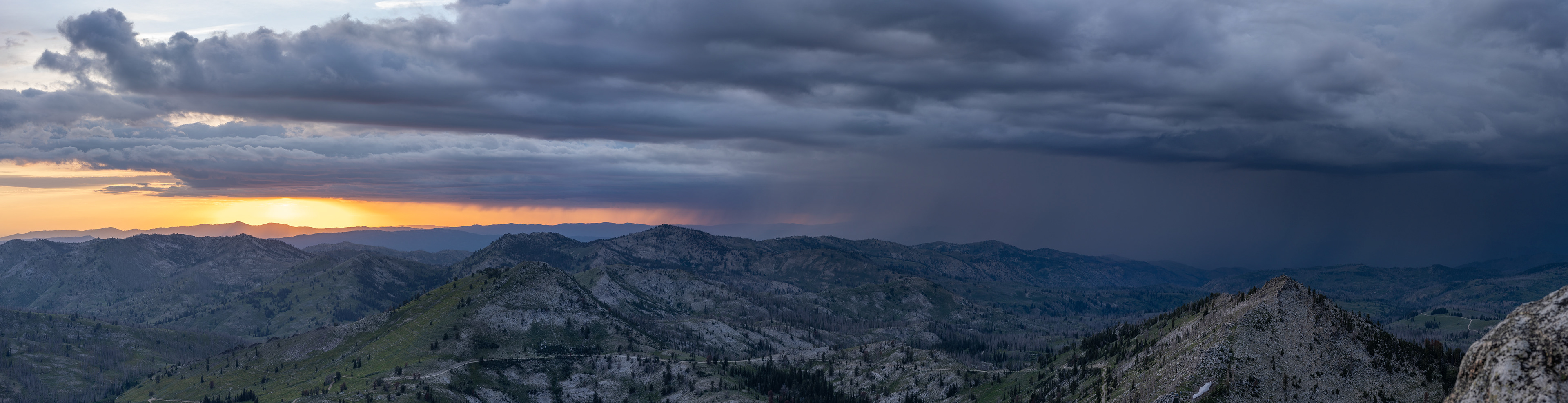 Dark clouds from the north were impressive but suggested a hasty retreat to camp