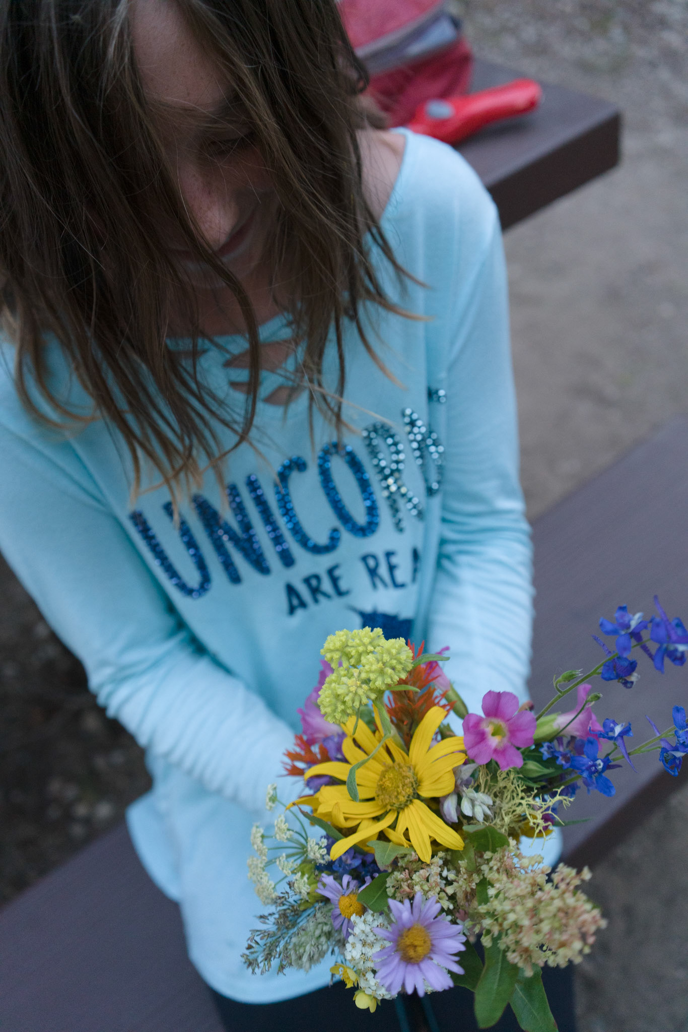 Brenna plucks samples of the many wildflowers as we carefully make our way down the steep slope. “Is there something we can put these in?” she wonders as we arrive at our campsite, her hands bursting with shapes and color.“I can’t think of anything,” I answer after making a mental review of our supplies.“That’s okay,” she concludes. “I’ll just set them here.”Bright light is streaming through the tent’s one little window as we settle into our sleeping bags for the night. Maybe someone’s headlights are pointing our way.Brenna is still sitting up so I ask, “can you see out the window what that light is?”“It’s the moon, dad,” she answers sardonically.“Oh.”We choose a lullaby to sing together, as we have every night since she was a baby, then drift side-by-side to the land of dreams.