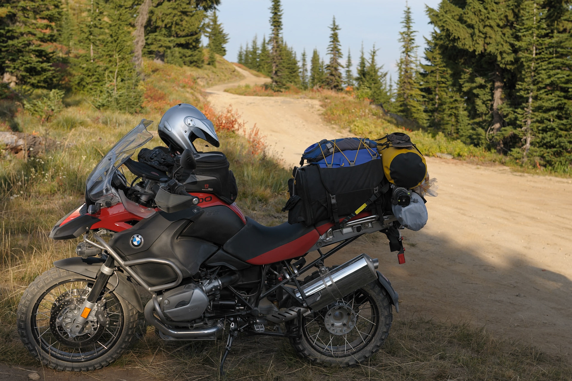 Full of gas and ambition, we left pavement for gravel then just dirt. It took only about twenty minutes to reach our cruising altitude of about 6,000 feet. We notice a little pull out with an area map and decided it was a good place to break.We didn’t rest long. We were eager to camp so we could lighten that load of beer.