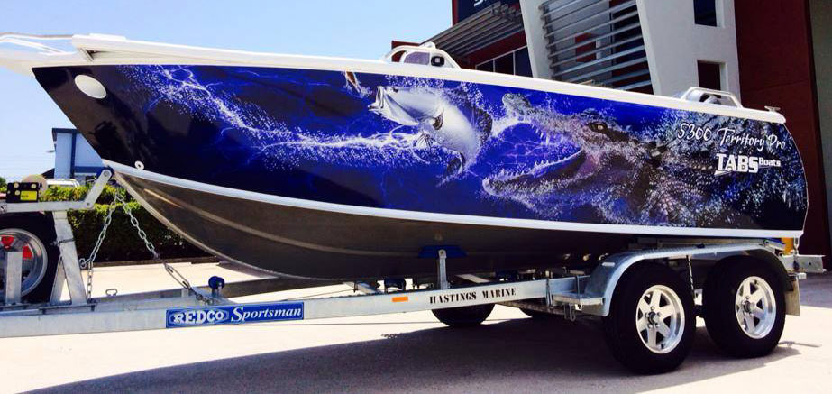 Boat wrapped with the Croc and Barra artwork