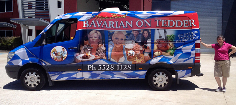 Bus wrap with perforated window and vinyl prints