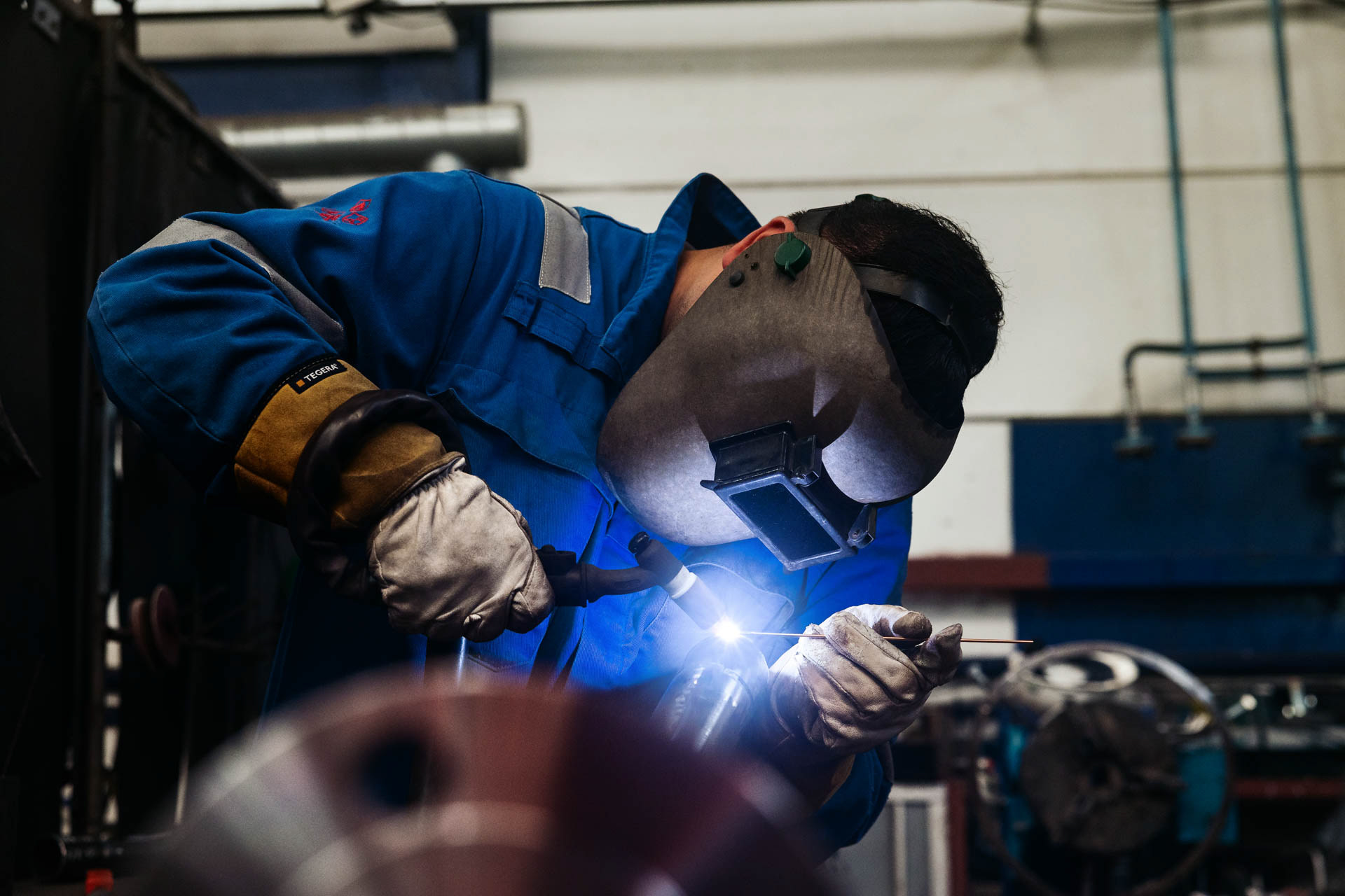 Industriele fotografie - Man aan het lassen