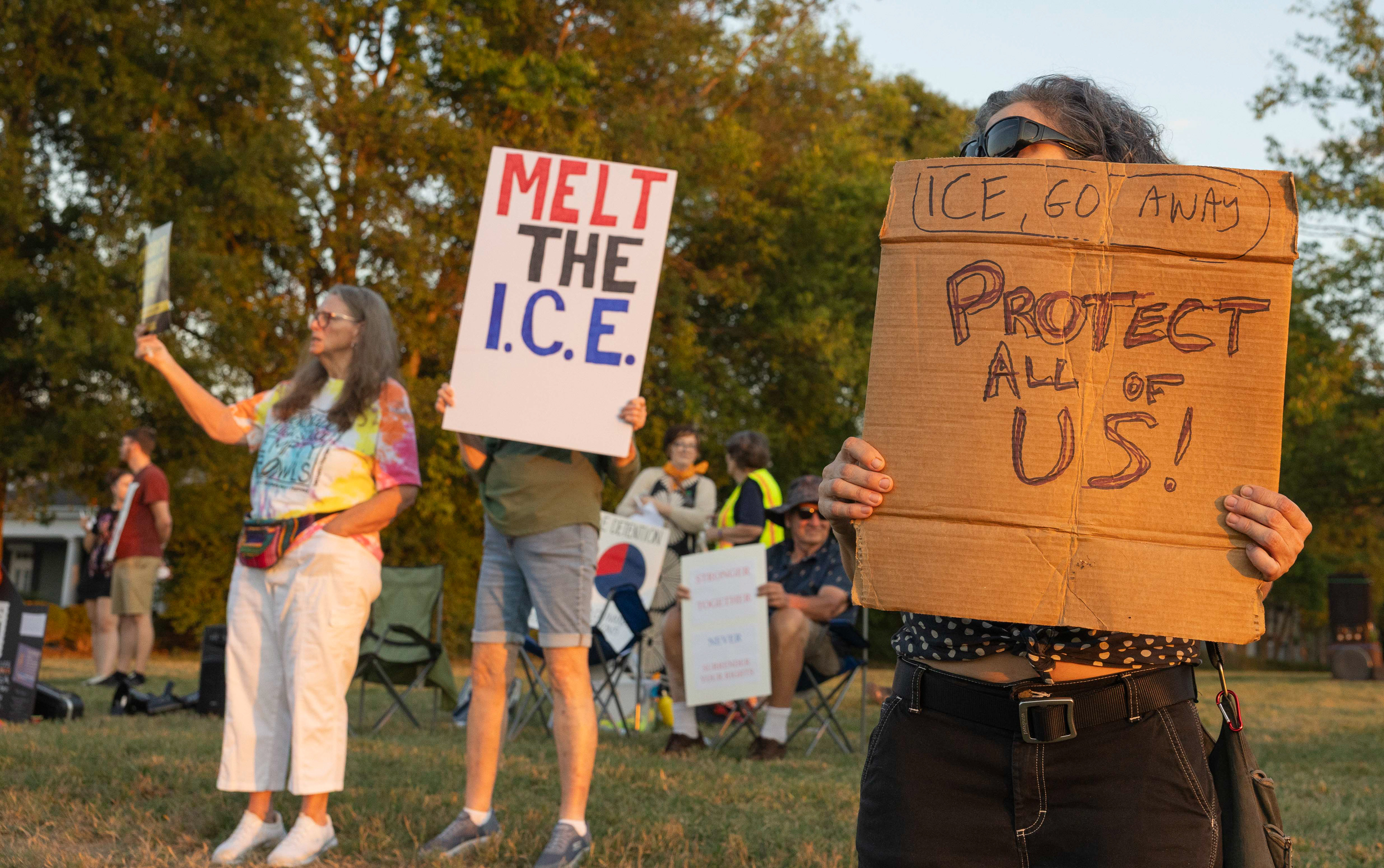 Attendees gather outside of ICE Headquarters for the ICE victim candlelight vigil on Monday, Sept. 15, 2025 in Bowling Green. 