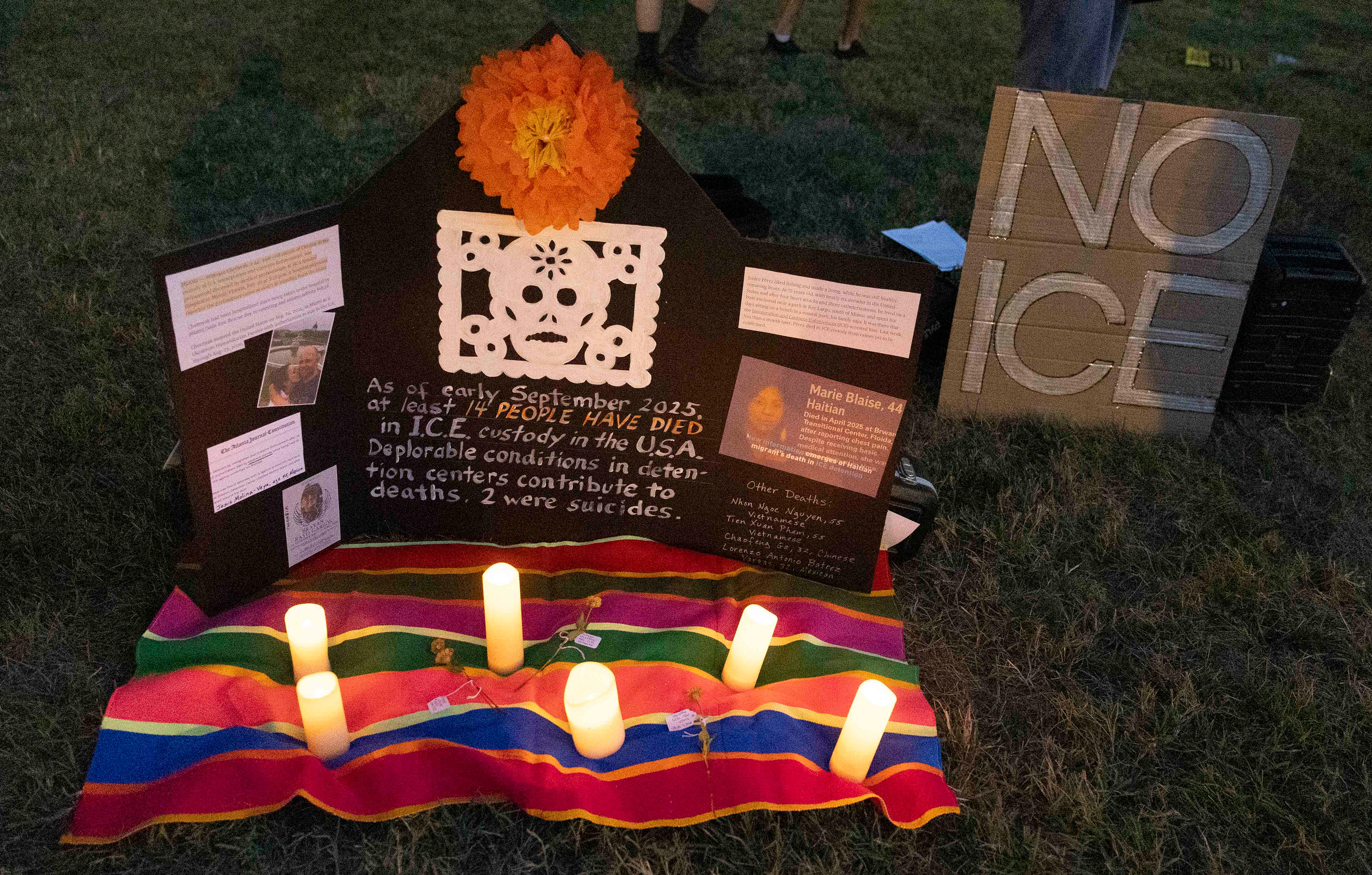 A memorial for the victims of ICE detainments, disappearings and killings is set up at the ICE victim candlelight vigil on Monday, Sept. 15, 2025 outside of ICE Headquarters in Bowling Green. 