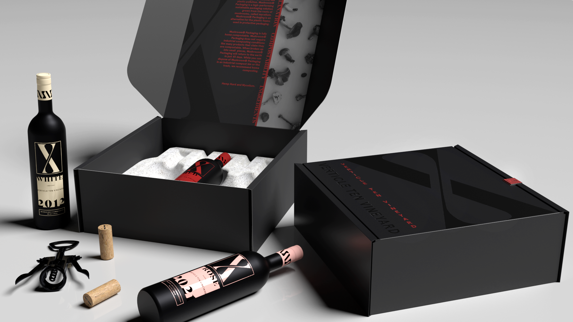Black subscription boxes housing three bottles of wine as well as a decorative wine opener.