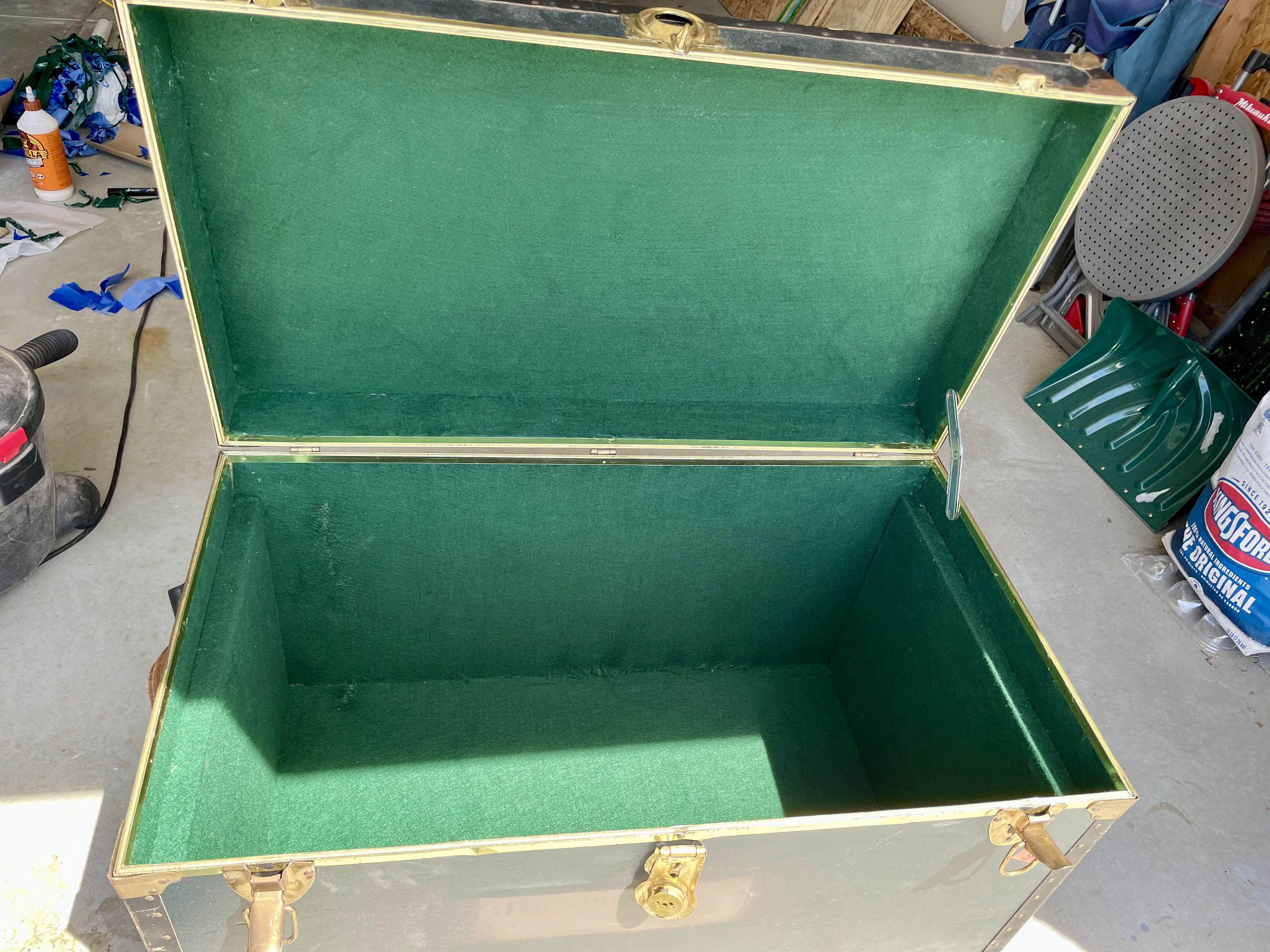 Refurbished storage trunk, lined with green felt