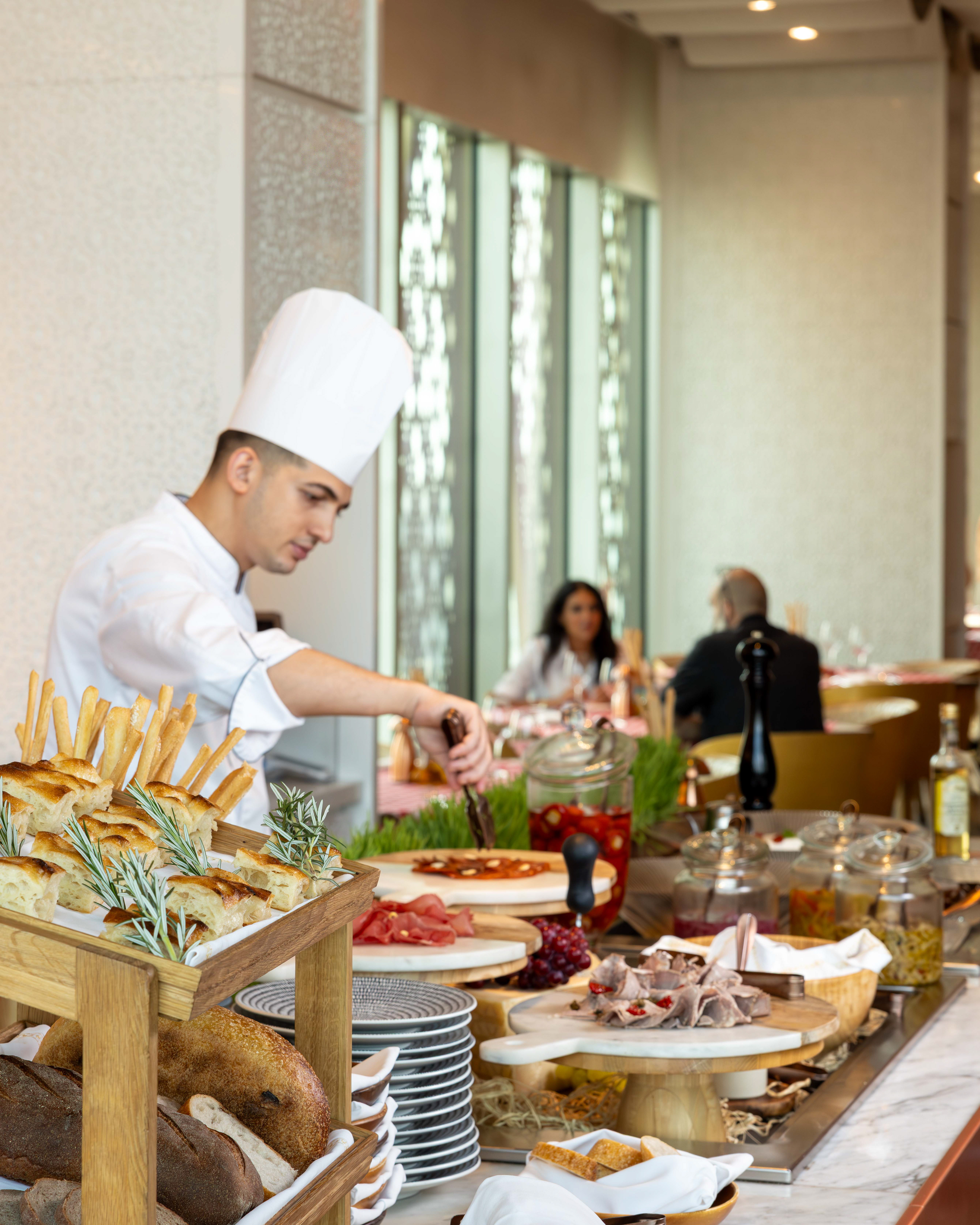 Savor the story behind every frame. The ambiance, the artistry, the aroma — Dai Forni, Four Seasons Kuwait, through our lens