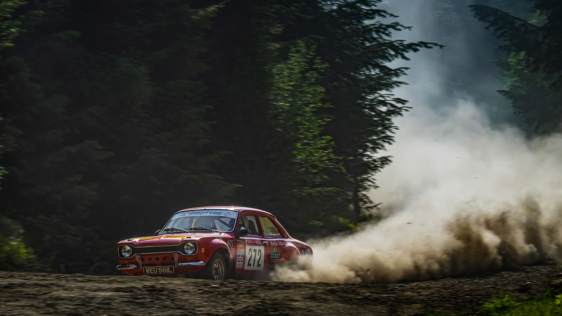 Jeremy Wells and Martin Saunders powering their MKI Ford Escort RS round a bend at the Plains Rally in North Wales.