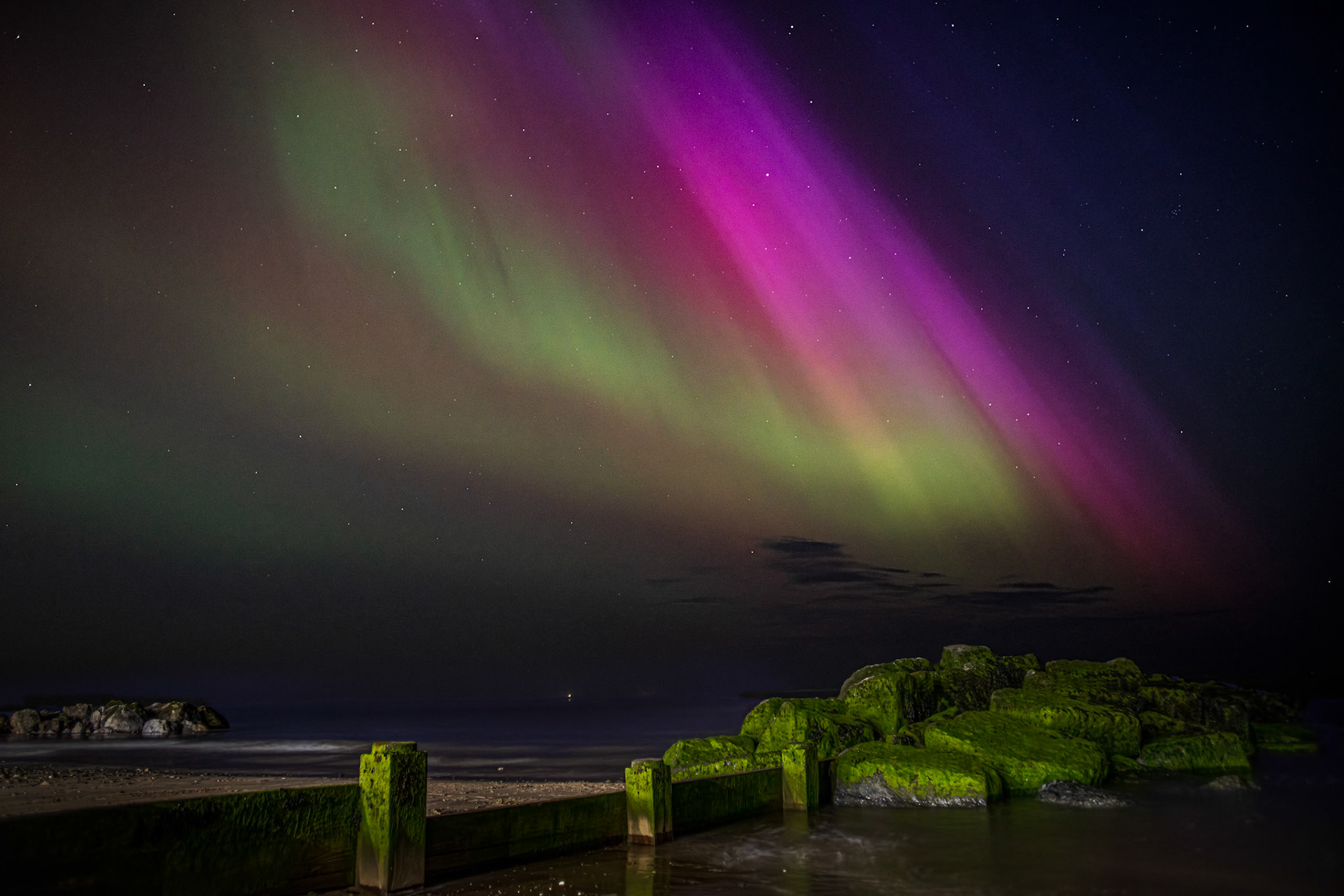 A stunning view of the aurora borealis from Cleveleys beach on what was the strogest showing of the lights for at least twenty years.