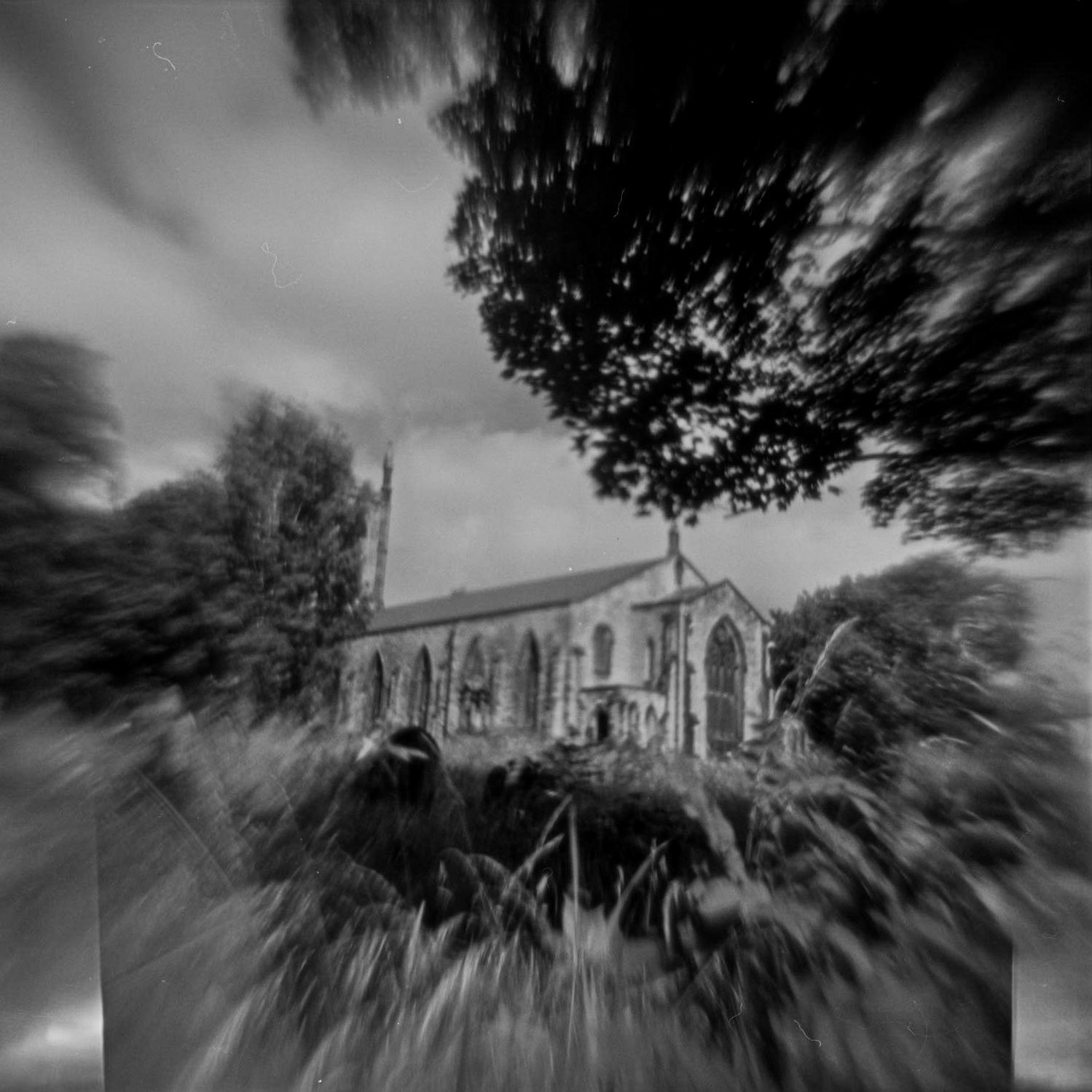 An old Kodak Creast camera, that I have taken the plastic lens out of and turned around. This gives a very distorted view of a scene, and, the sharpness that many photographers strive for in their images is not present anywhere!