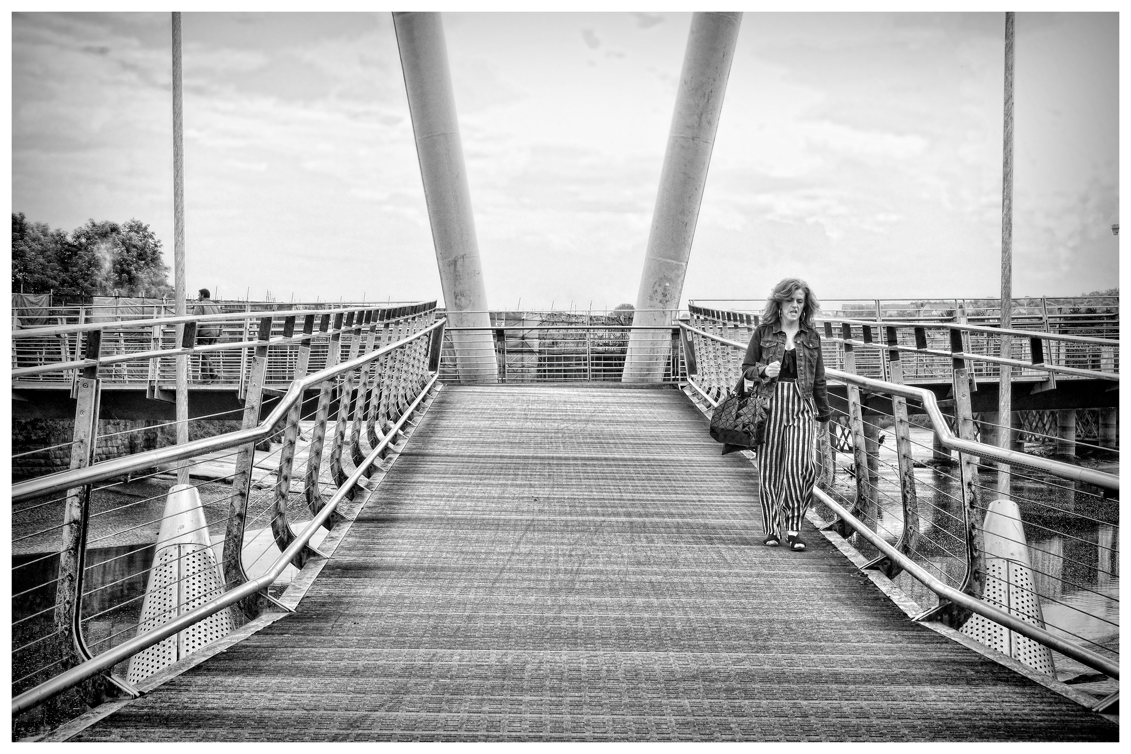 Women in Stripey Trousers on bridge in Lancaster