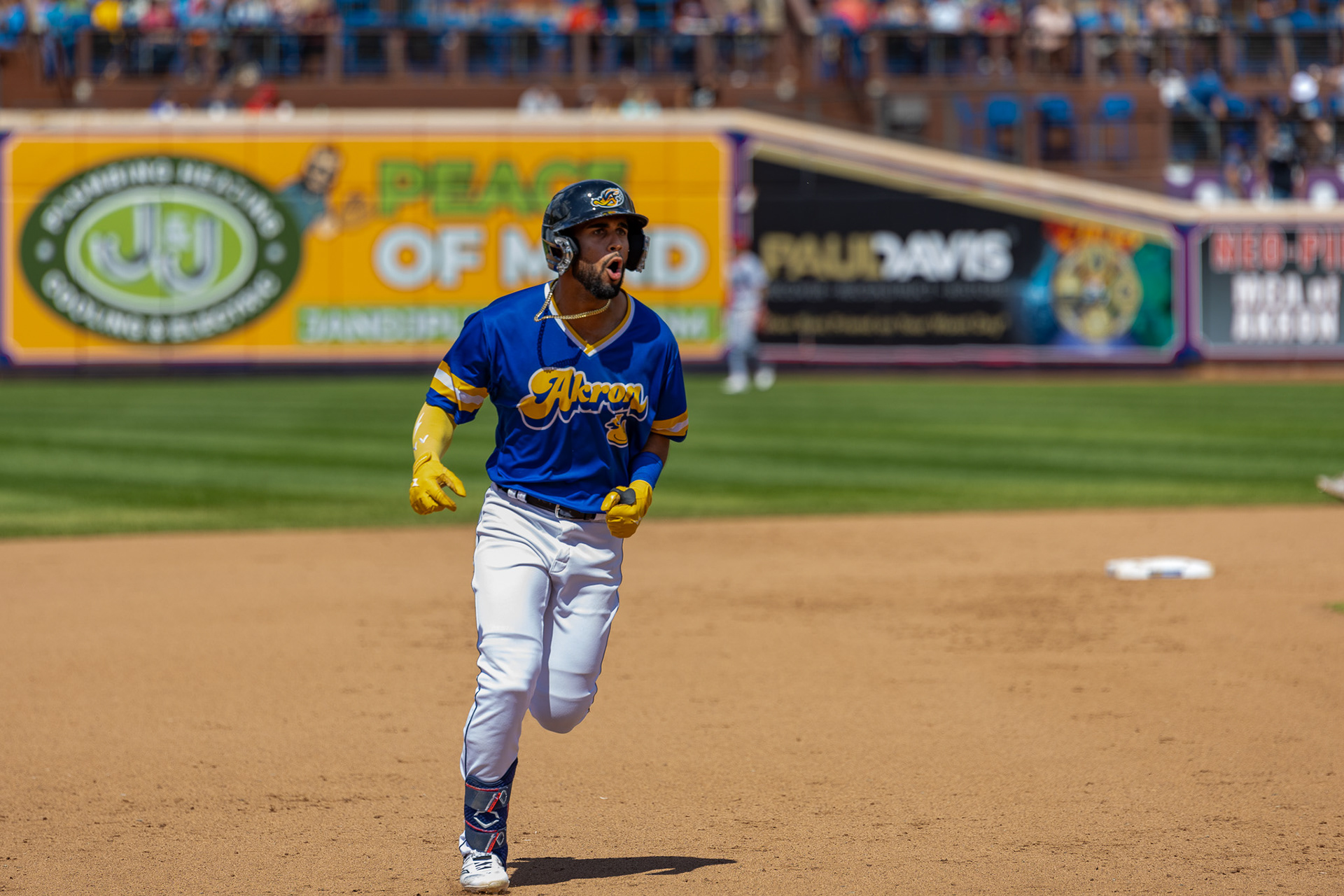 Yordys Valdes celebrates his home run while running the bases at Canal Park on August 11 2024.