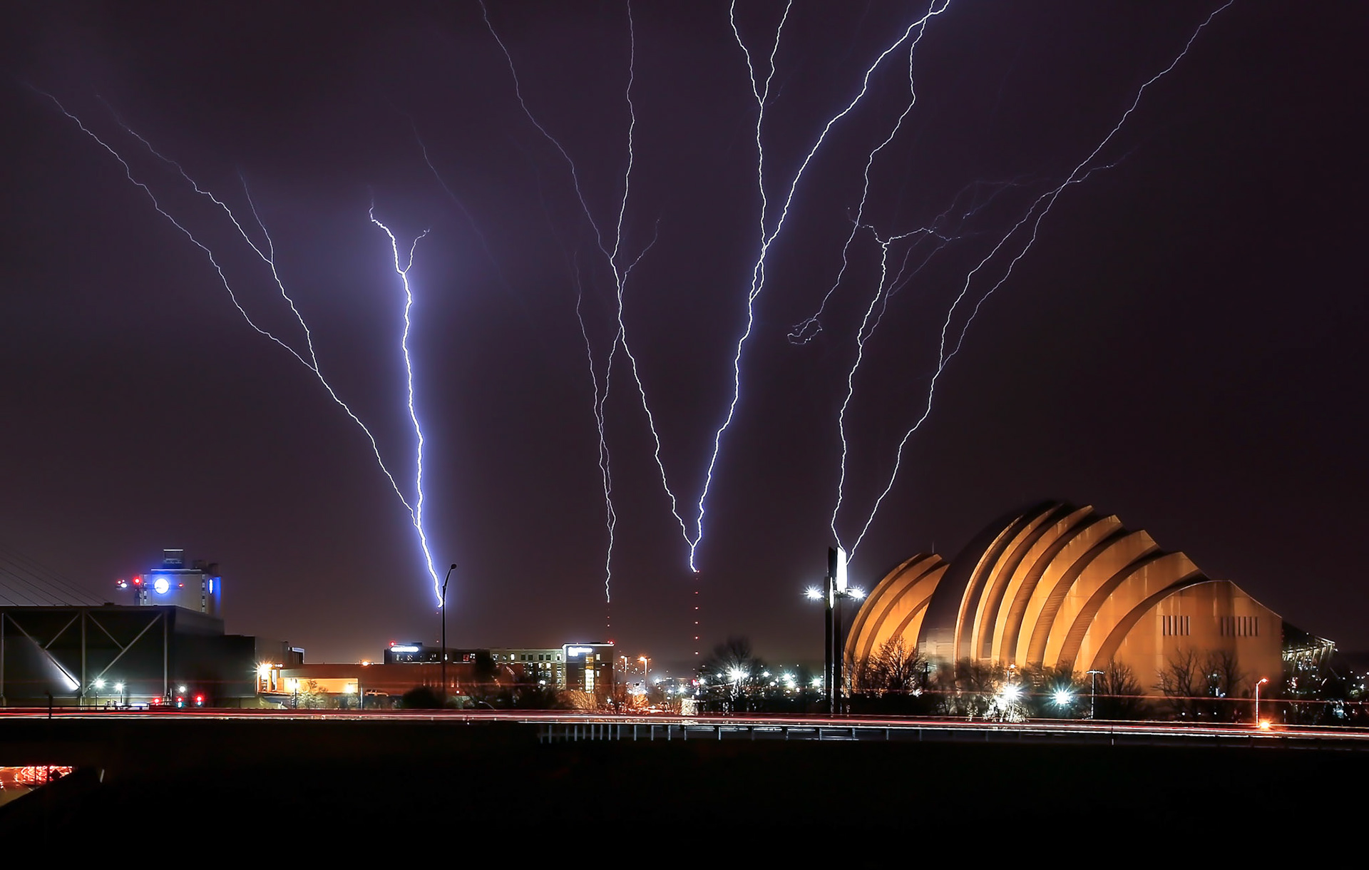 Lightning strikes radio towers near downtown Kansas City as storms moved across northeast Kansas. (Chris Neal/The Capital-Journal)