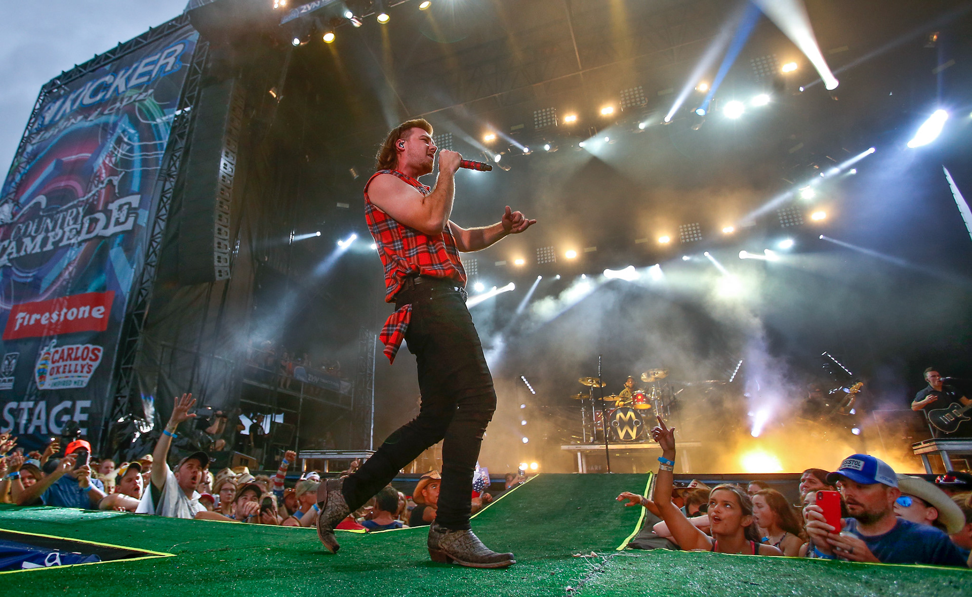 Country music artist Morgan Wallen performs at the Kicker Country Stampede on Saturday at Heartland Motorsports Park. [Chris Neal/The Capital-Journal]
