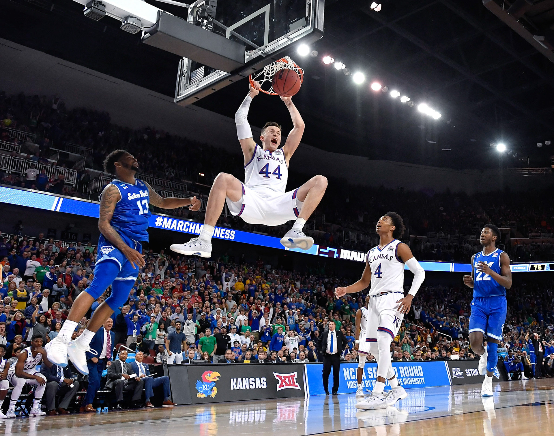 Kansas tops eighth seeded Seton Hall, 83-79, Saturday night in Wichita to advance to the NCAA Tournament's Sweet Sixteen in Omaha.