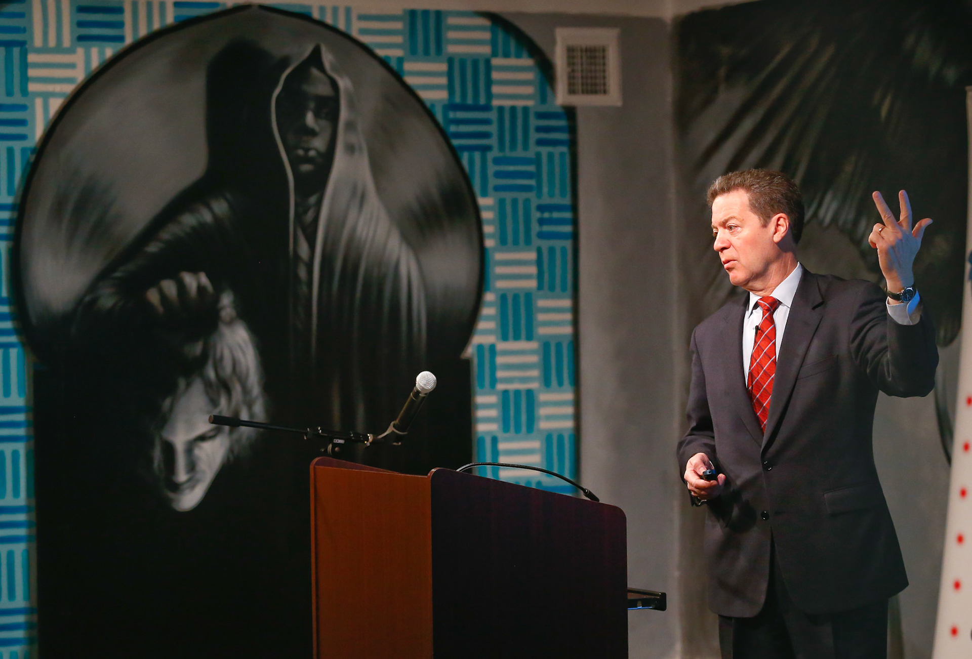 Kansas Gov. Sam Brownback talks about hourly wage growth in Kansas while giving a speech on Thursday March 5, 2015, during a Show-Me Institute breakfast at the World Chess Hall of Fame in St. Louis.