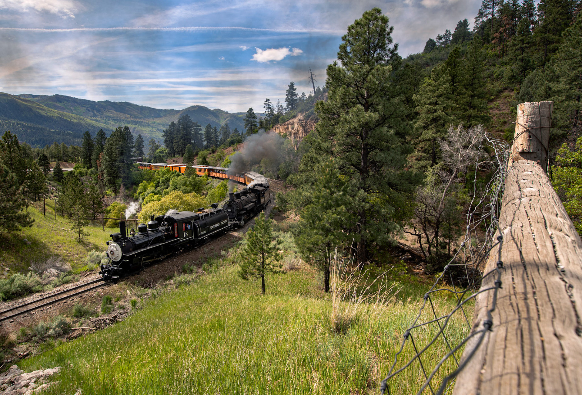 The Durango and Silverton Narrow Gauge Railroad train travels underneath U.S. Highway 550 while working its way North towards Silverton, Colo., on Wednesday, June 2, 2021. [Chris Neal/Shooter Imaging]