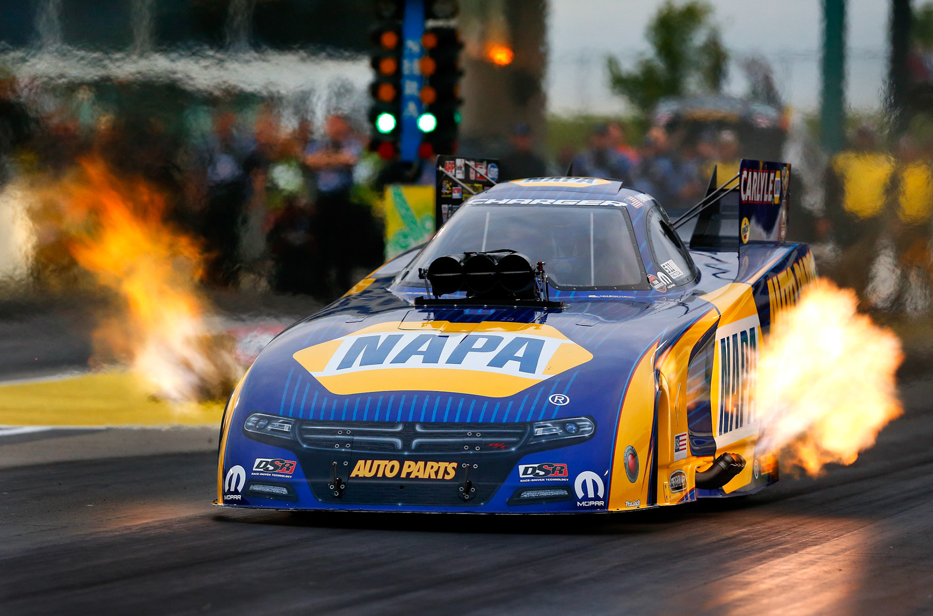 Funny Car driver Ron Capps tears down the track at Heartland Park on May 22, 2015.