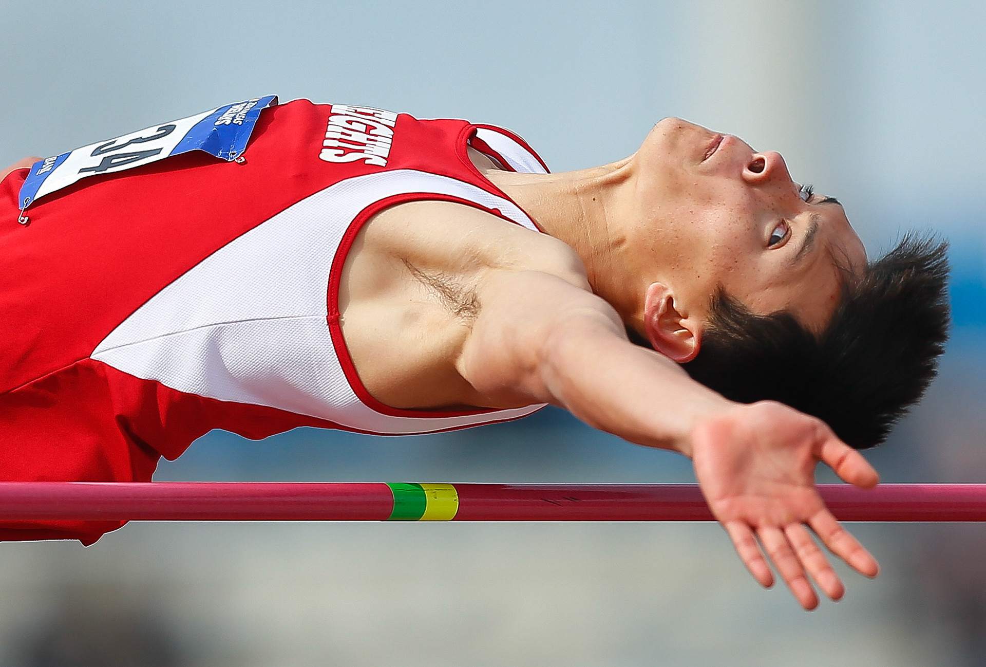 Shawnee Heights' Michael Hoffer competes in the high jump during Friday morning's Kansas Relays in Lawrence. Hoffer took second place in the event with a jump of 6-8. 