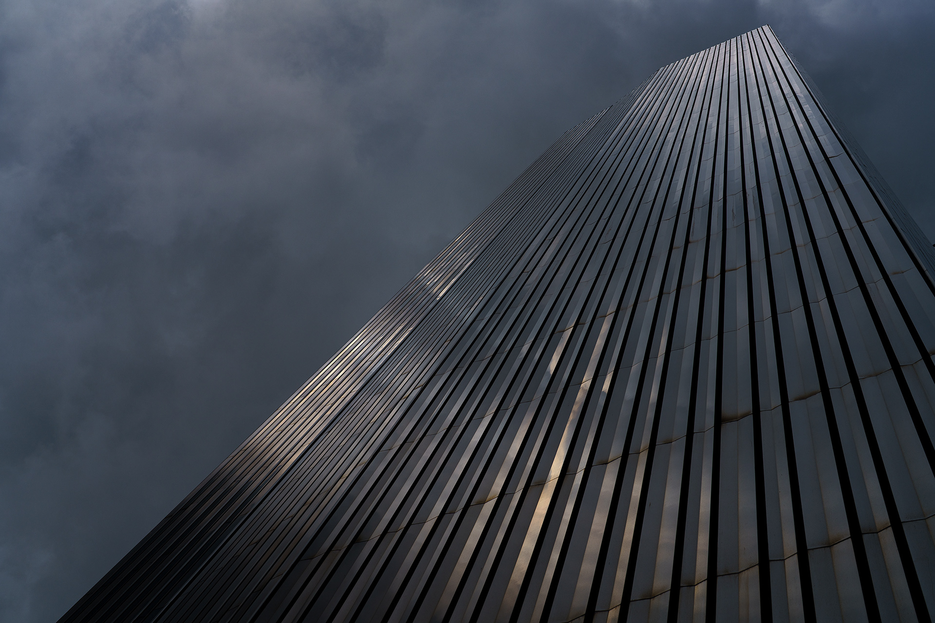 Sunlight cutting through vertical structure with soft shadows. Photograph by the professional photographer Ryan Bucchianeri.