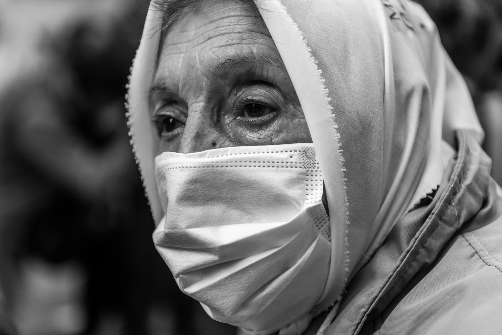 “Mother of the Plaza de Mayo” One of the Mothers of the Plaza de Mayo walks towards the iconic square during a March 24th protest.
