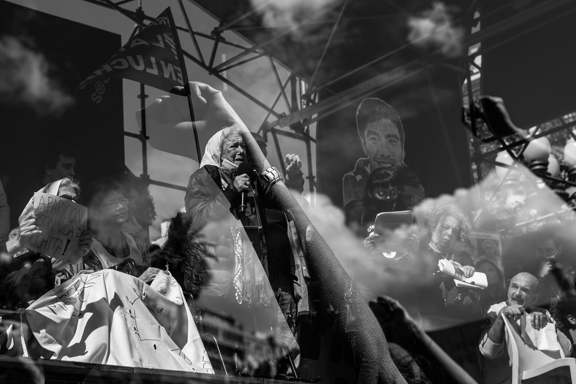 “Emotion on The Skin” Nora Cortiñas, Co-Founder of Mothers of the Plaza de Mayo, speaks to the human rights protesters. One of them raises their fist, showing goose bumps due to strong emotional feelings.
