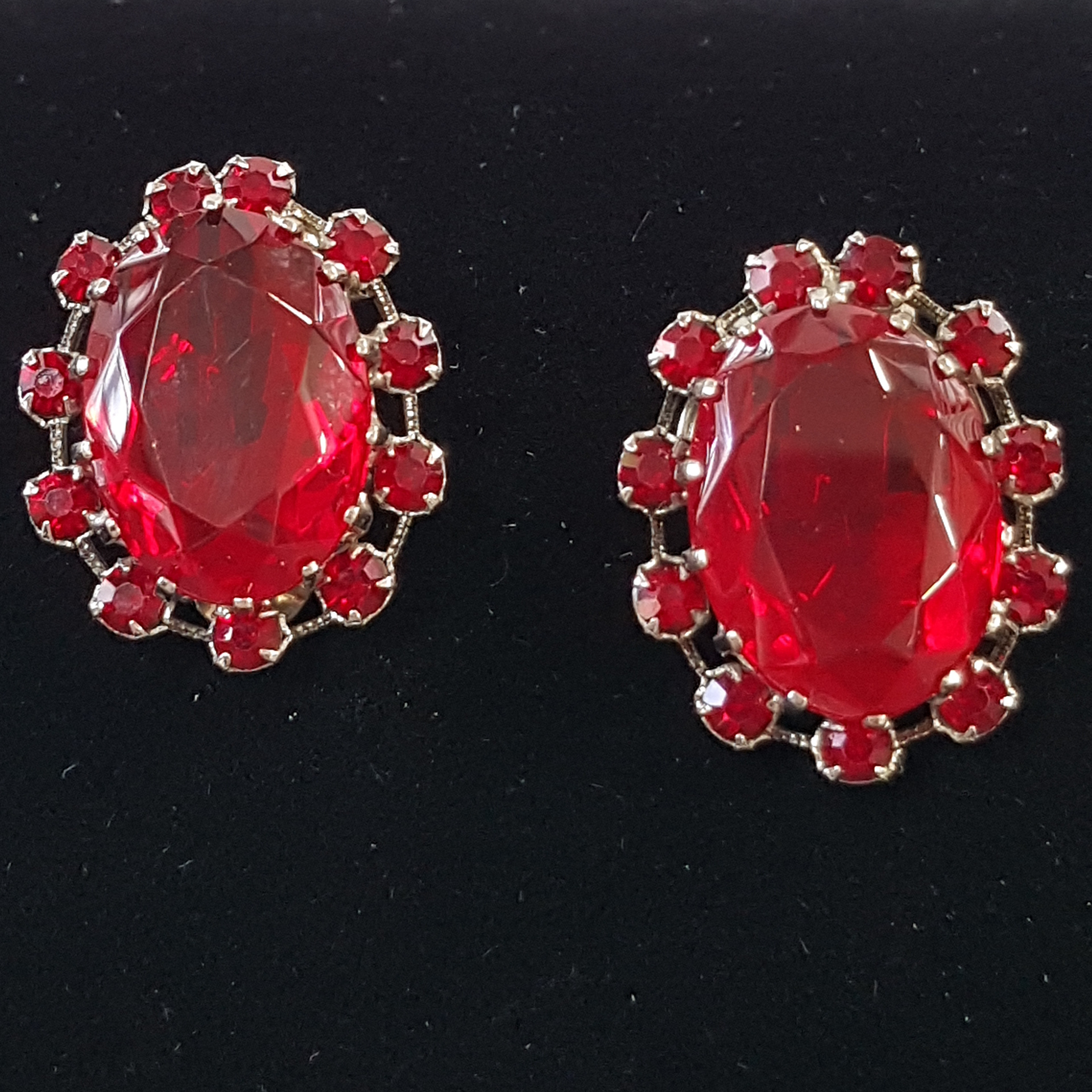 C.1960 ruby glass clip ons