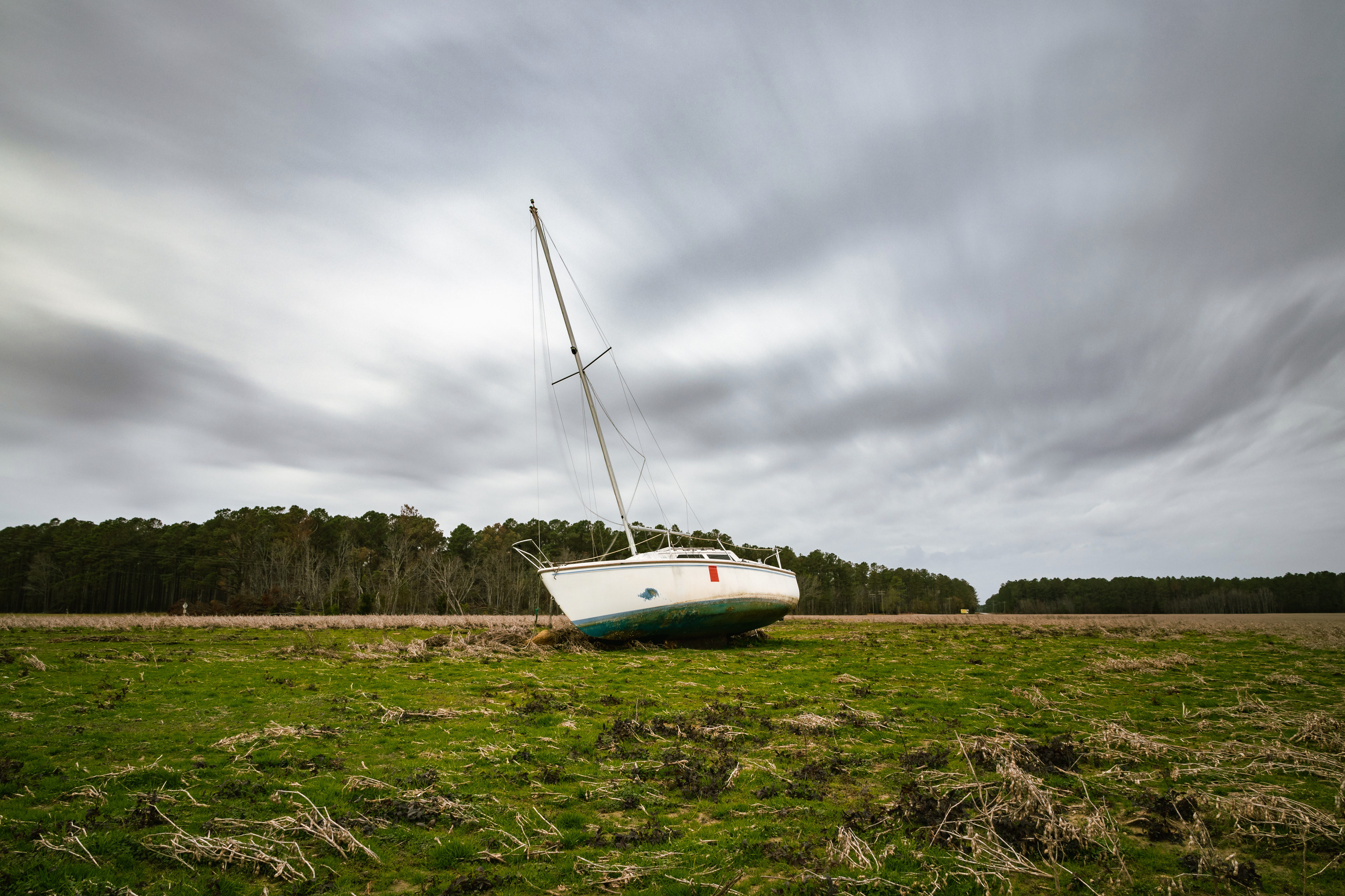 Stranded Sailboat in a Field