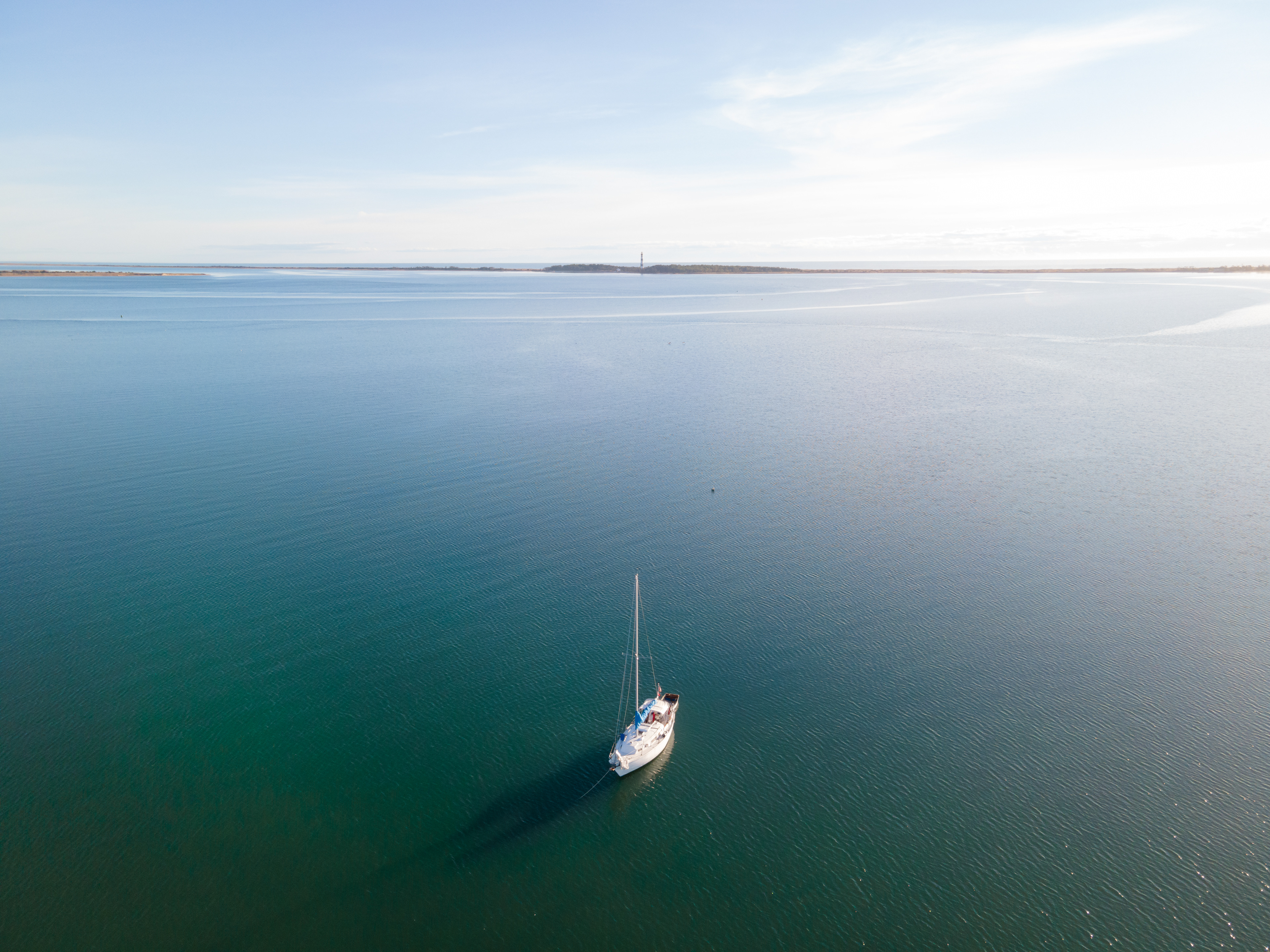 Sailboat Anchored near Cape Lookout Lighthouse