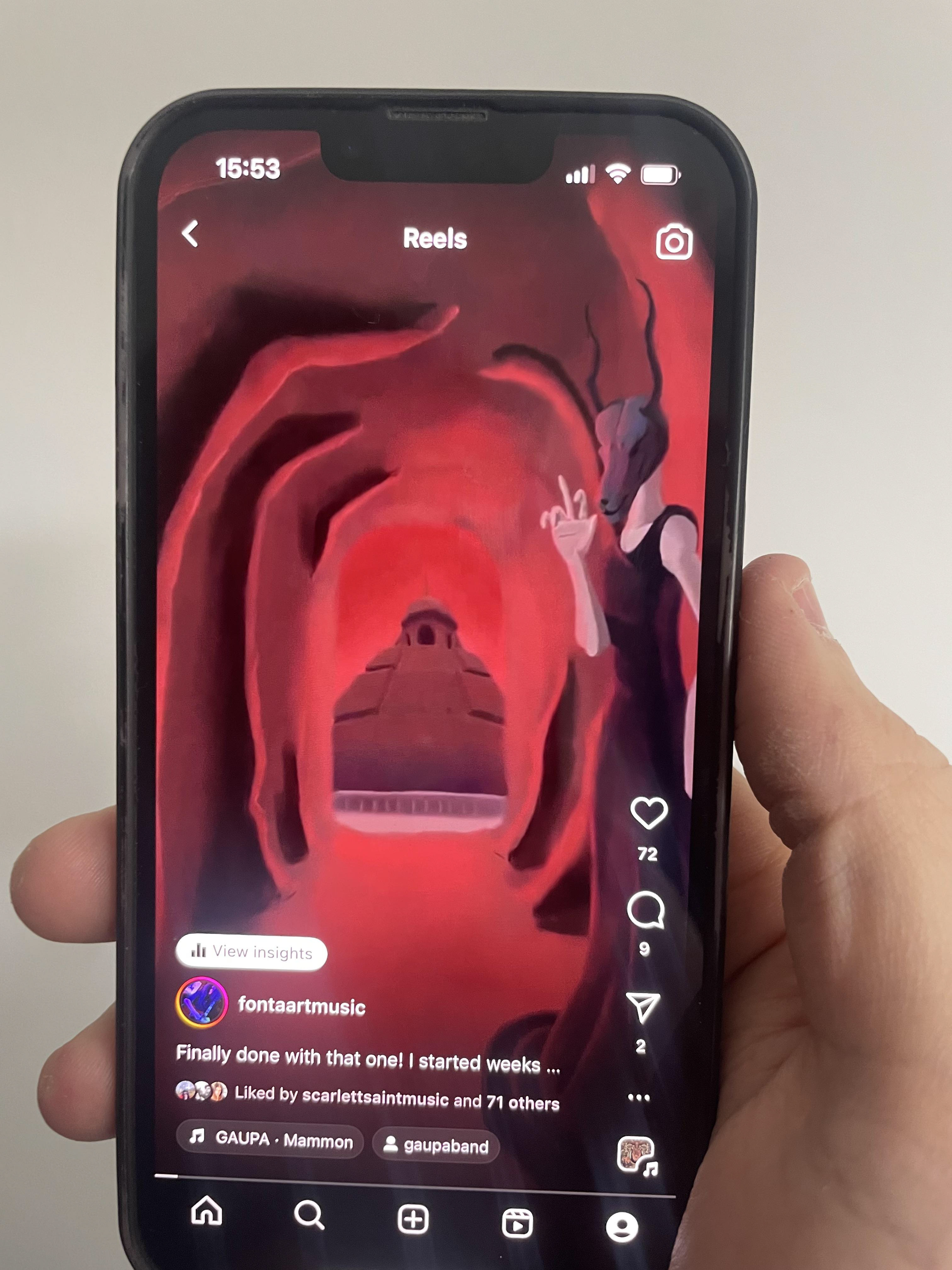 Photo of a smartphone showing the artwork on the Instagram app