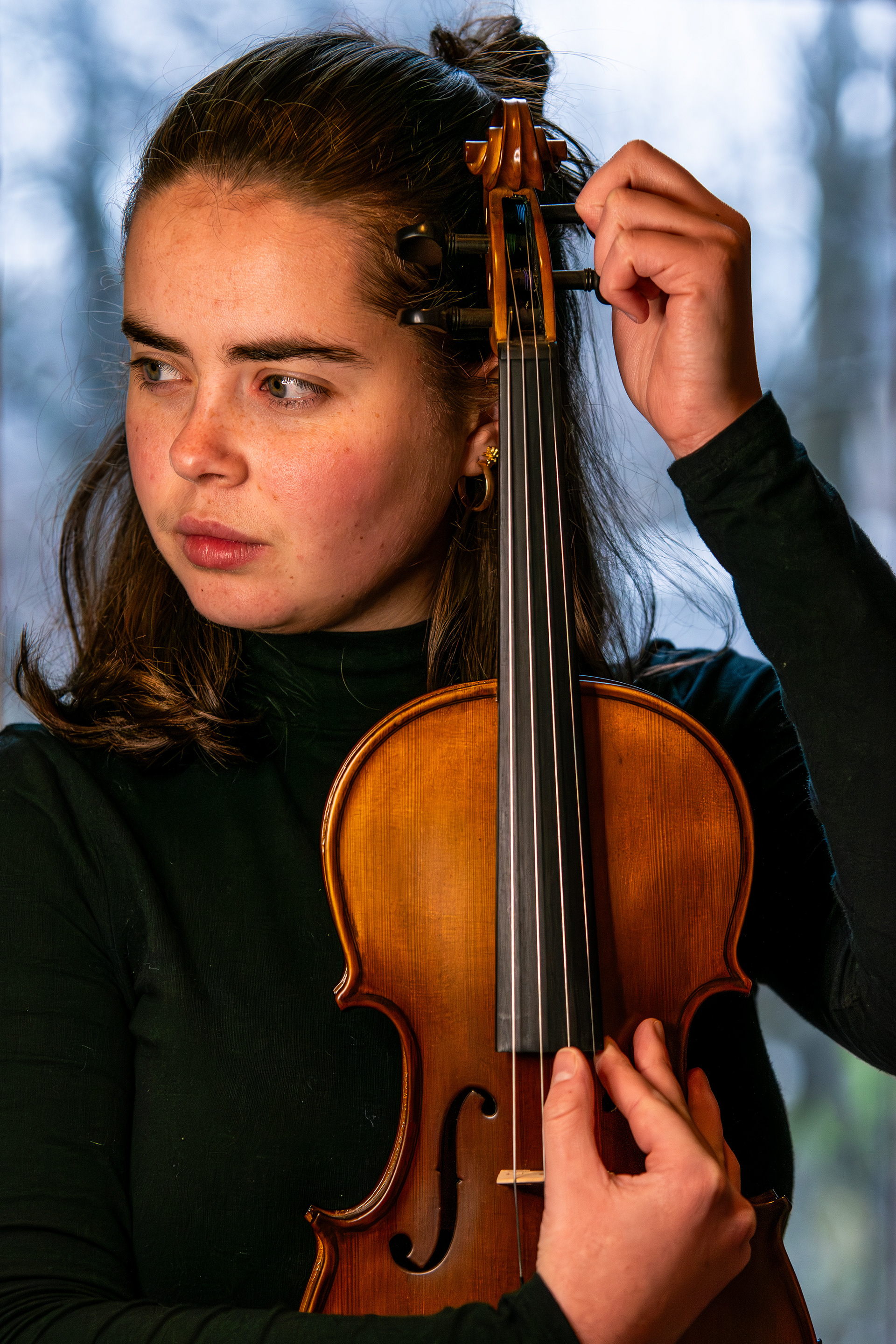 From my portrait series 'The Musician'. Shot in a pseudo-documentary style, this portrait series follows a dedicated musician as she explores her emotional relationship with music, capturing the various ways that music manifests in life. 