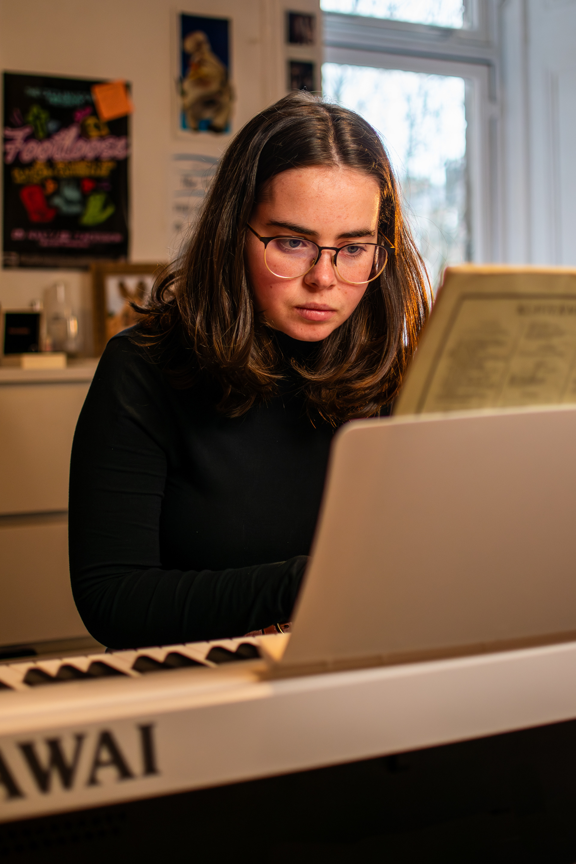 From my portrait series 'The Musician'. Shot in a pseudo-documentary style, this portrait series follows a dedicated musician as she explores her emotional relationship with music, capturing the various ways that music manifests in life. 
