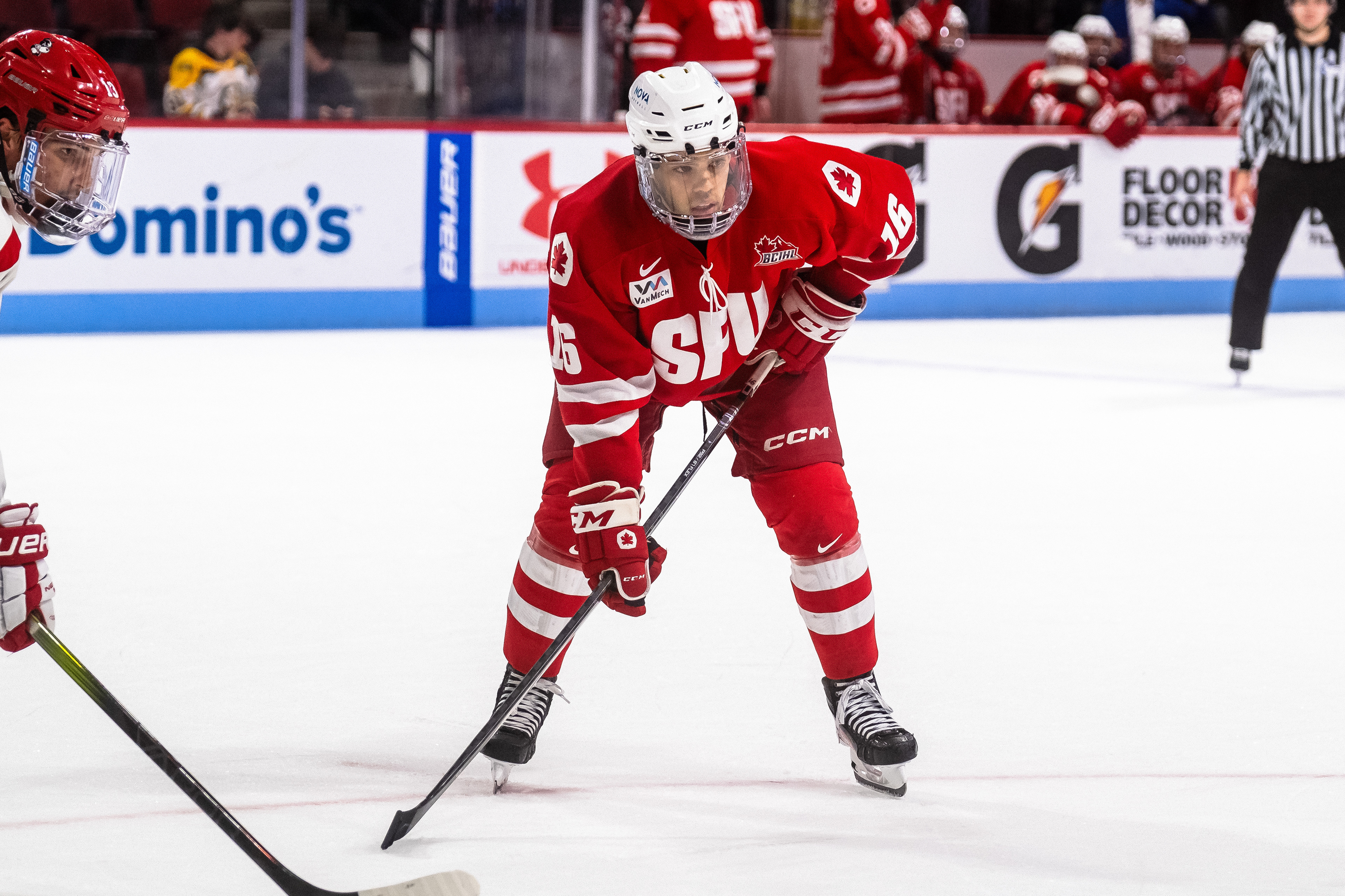 SFU at Boston University 01.05.24 | Forward Mateo Coltellaro lines up for a faceoff.