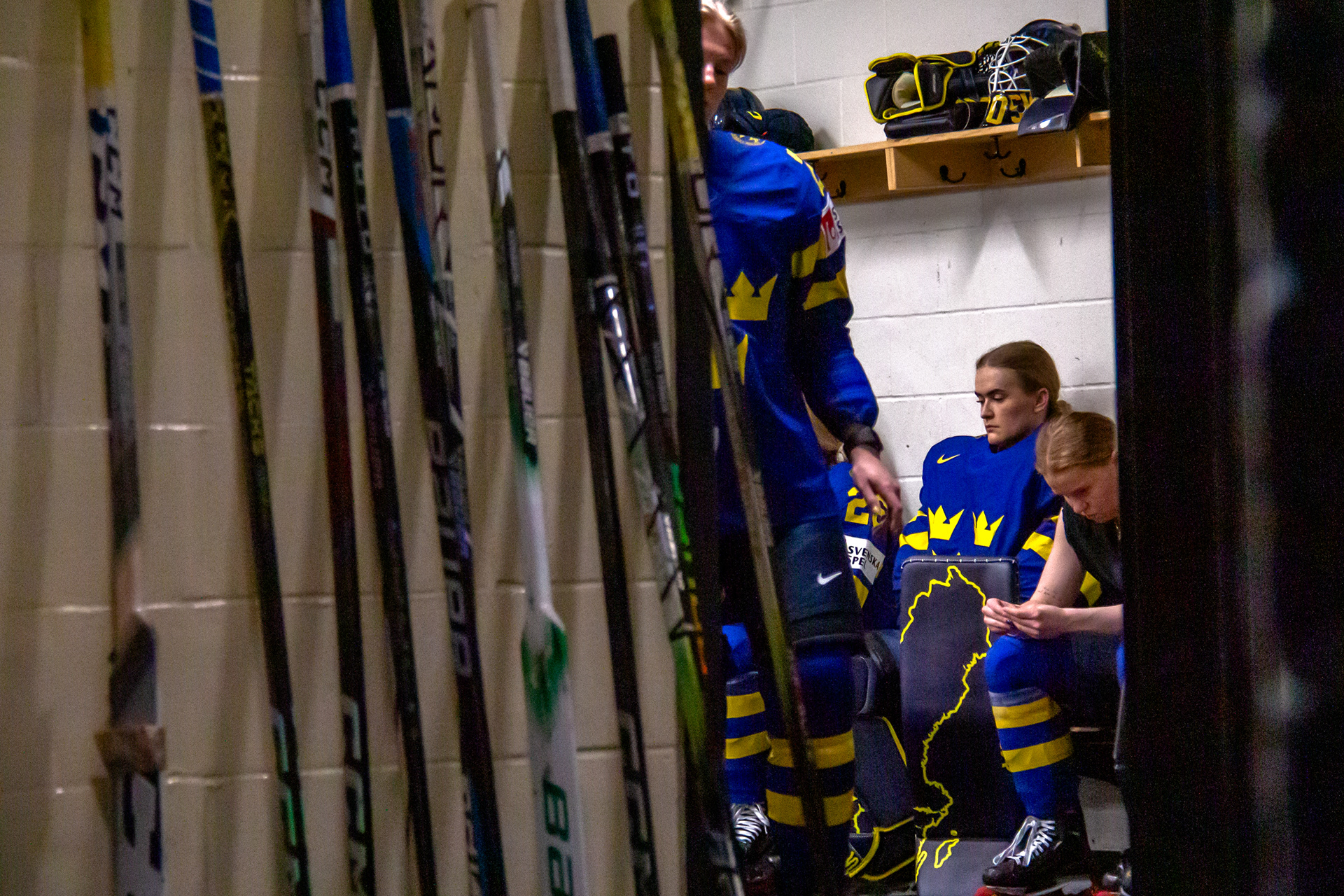 Goalie Emma Söderberg regroups with her team in the locker room after the Sweden-Germany preliminary round game of the IIHF Women’s World Championships at the Adirondack Bank Center in Utica, New York on April 7, 2024.