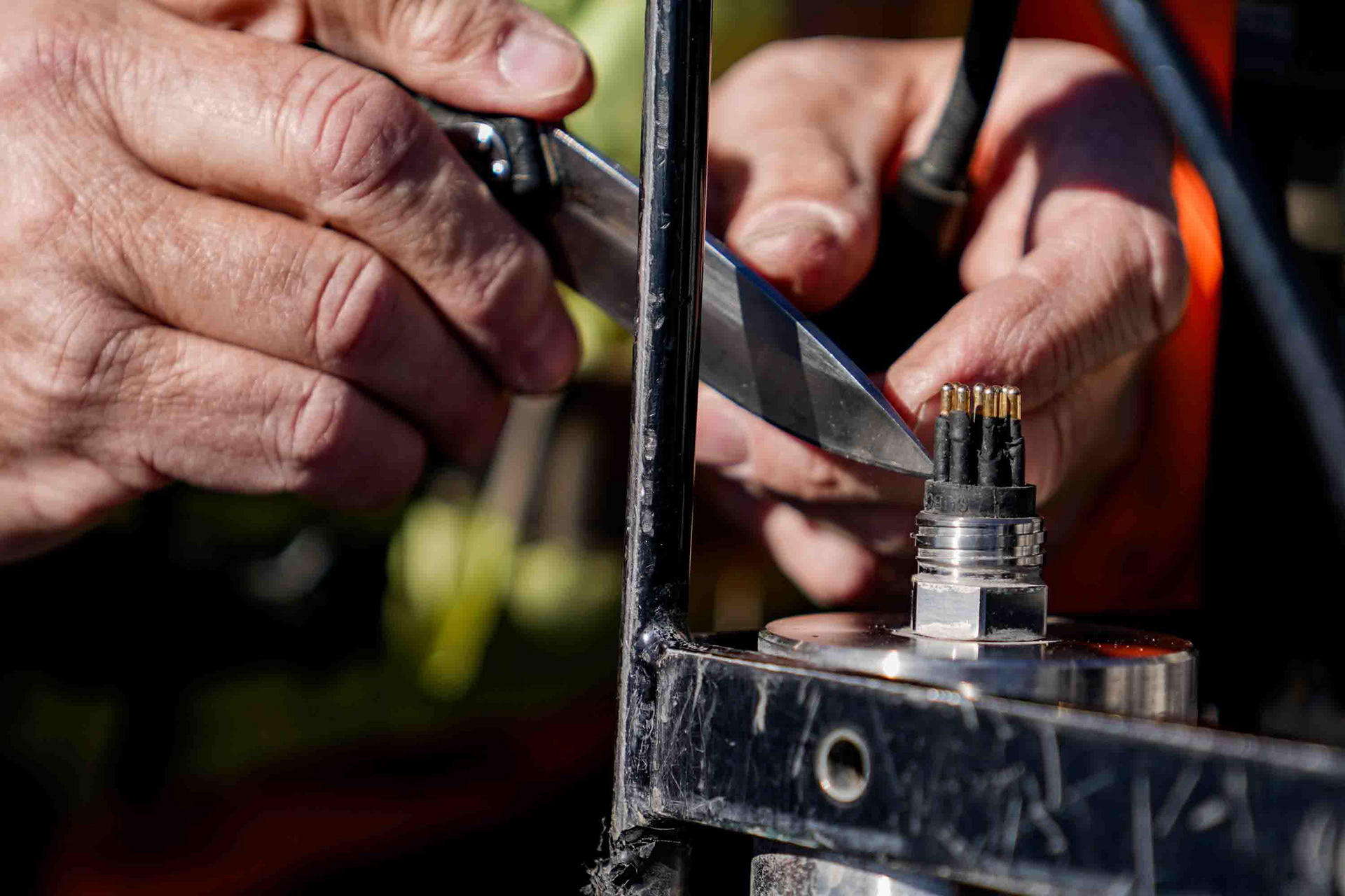 Bruce Wagner attempts to fix the water monitoring system on Monday, October 27. As support for science dwindles, the Upstate  Freshwater Institutes access to resources has also decreased. Much of their equipment is in disrepair and requires constant  maintenance, much of which Wagner does on the fly while out on Onondaga Lake.