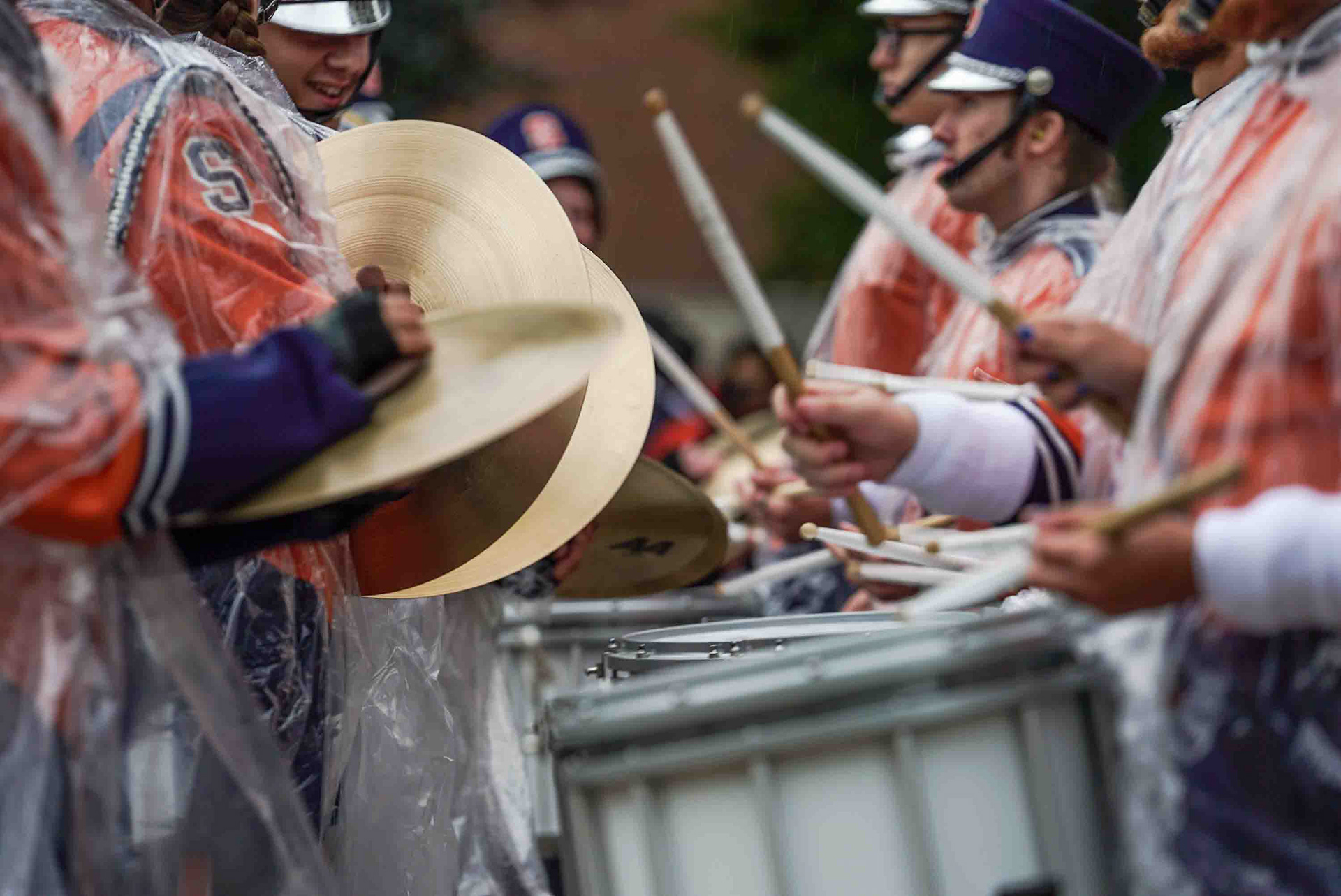 The Syracuse drum line performs in front of Hendrick's Chapel during Cuse on the Quad.