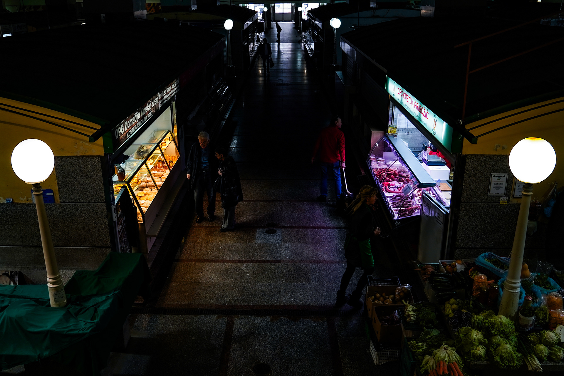 In Zagreb’s Dolac Market, tourists mingle with locals over produce and handmade goods—an exchange that fuels both the economy and a sense of shared daily life. This market once served as a bomb shelter during the civil war.