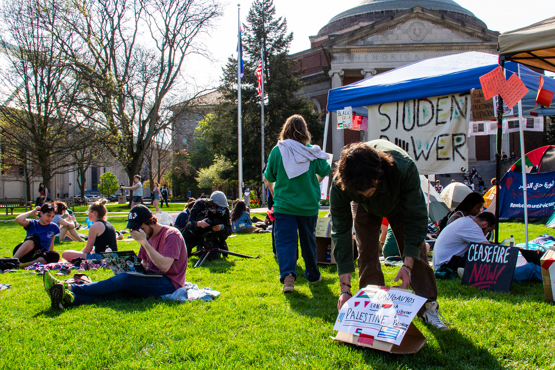 Syracuse student protestors stock the encampment with supplies, tents, and signs.