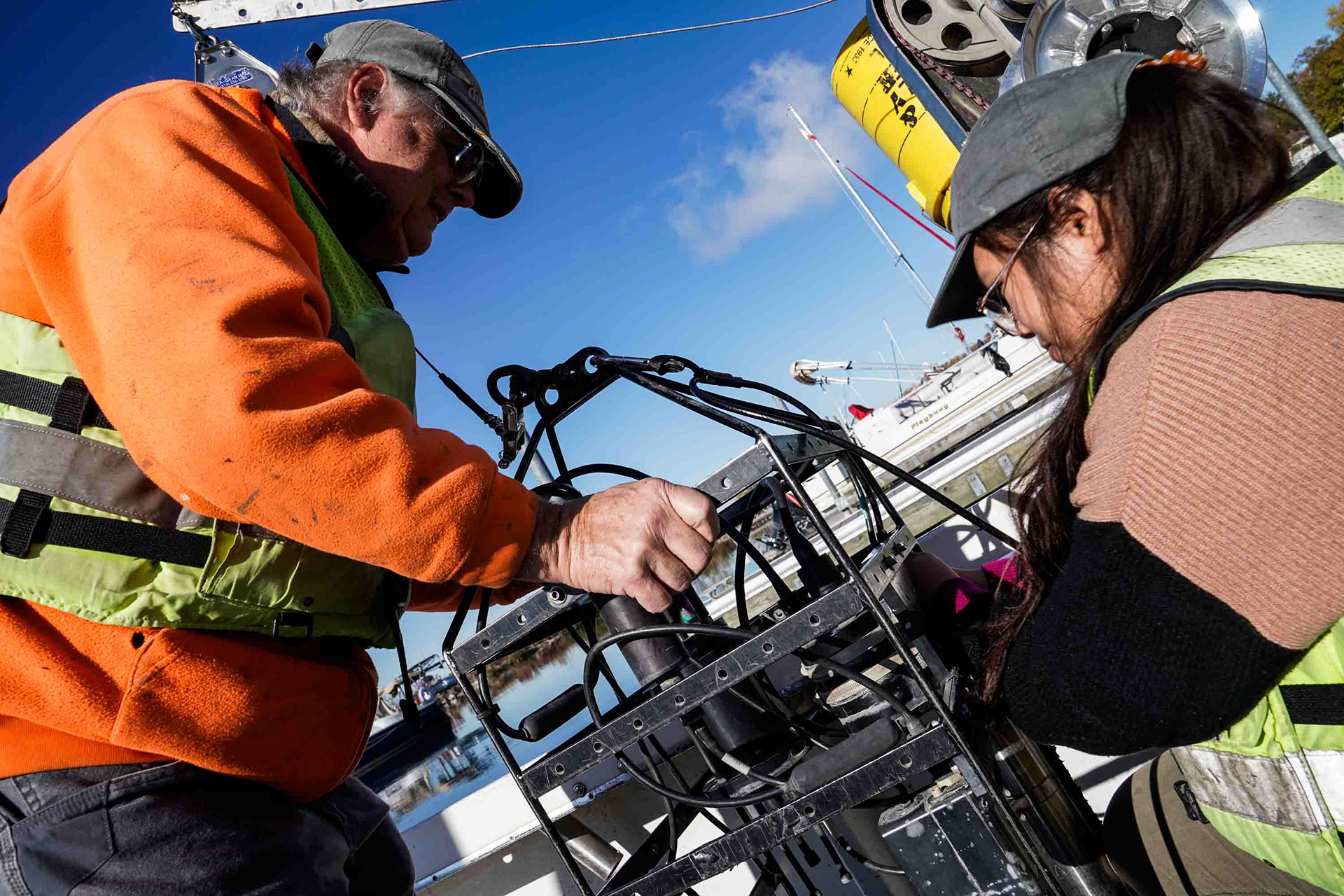 Scientist Bruce Wagner and his assistant Wint Maw prepare the device which spreads nitrate at the bottom of Onondaga Lake on  Monday, October 27. This process stops the methylation of mercury which is the process where certain microorganisms, like  bacteria, convert inorganic mercury into a toxic organic form called methylmercury. Onondaga Lake still has excess levels of mercury  at lower levels of the lake, and spreading nitrate limits the mercury's ability to entire the food chain.
